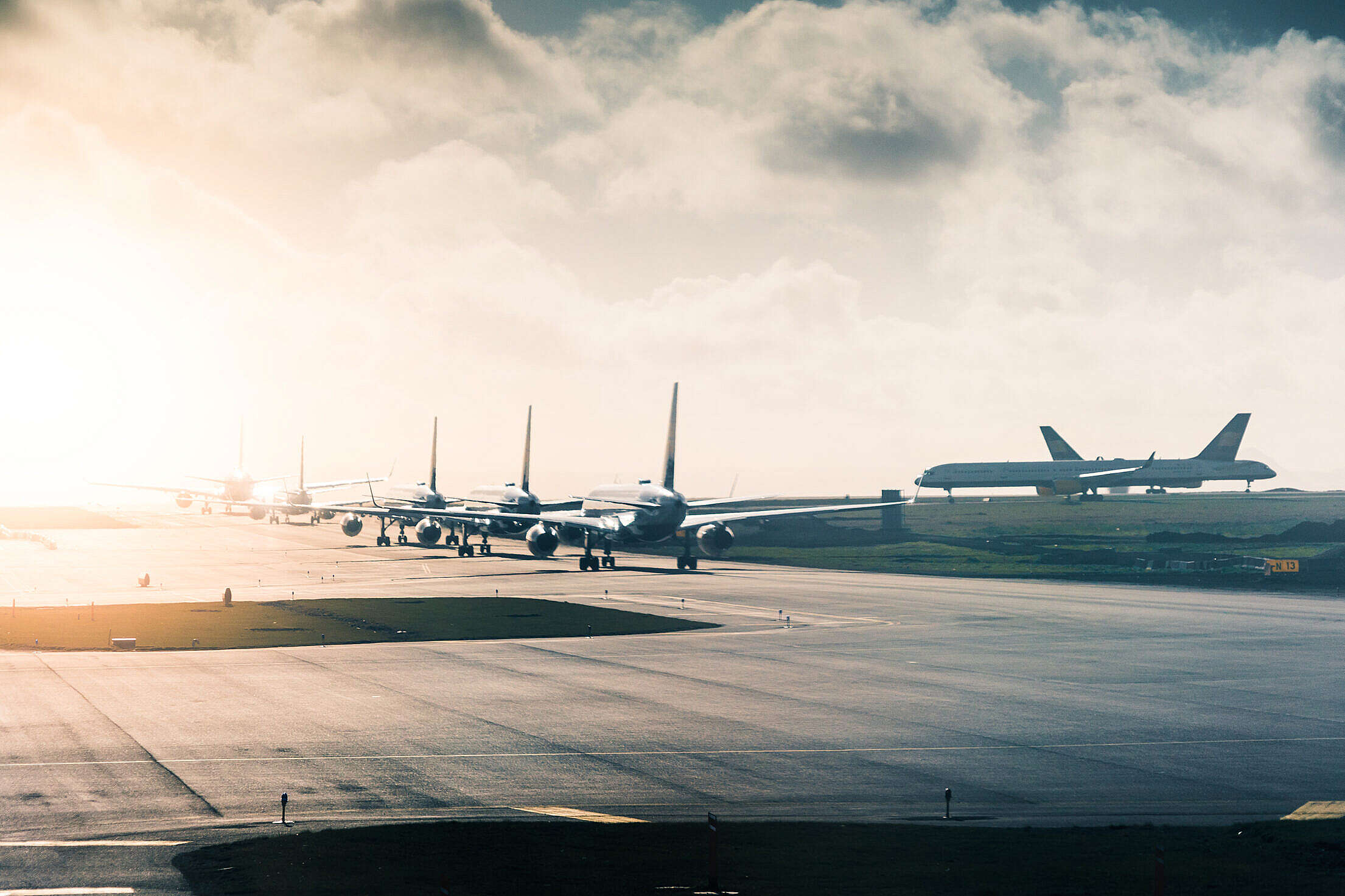 Airport Taxiway Long Queue of Planes Free Stock Photo