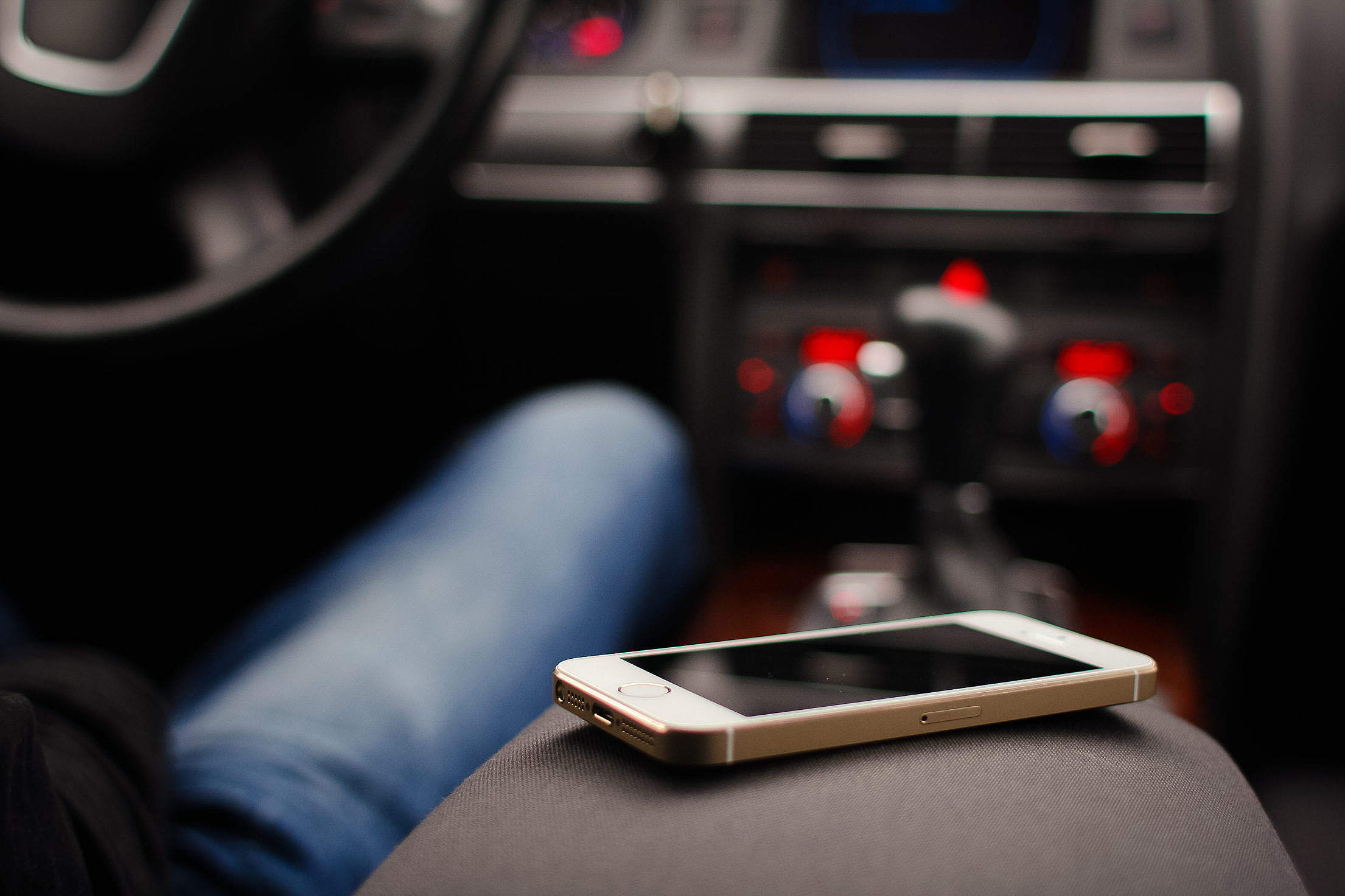 An iPhone 5S in a Car Free Stock Photo