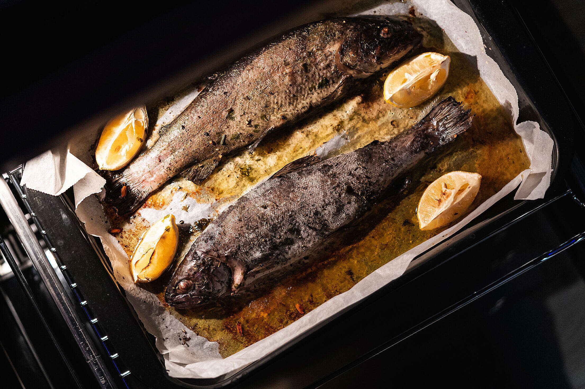 Baked Trout on Butter and Herbs with Lemon Free Stock Photo