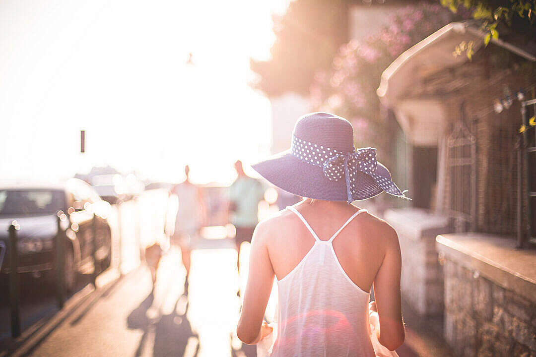 Download Beautiful Girl with Hat in Sun FREE Stock Photo