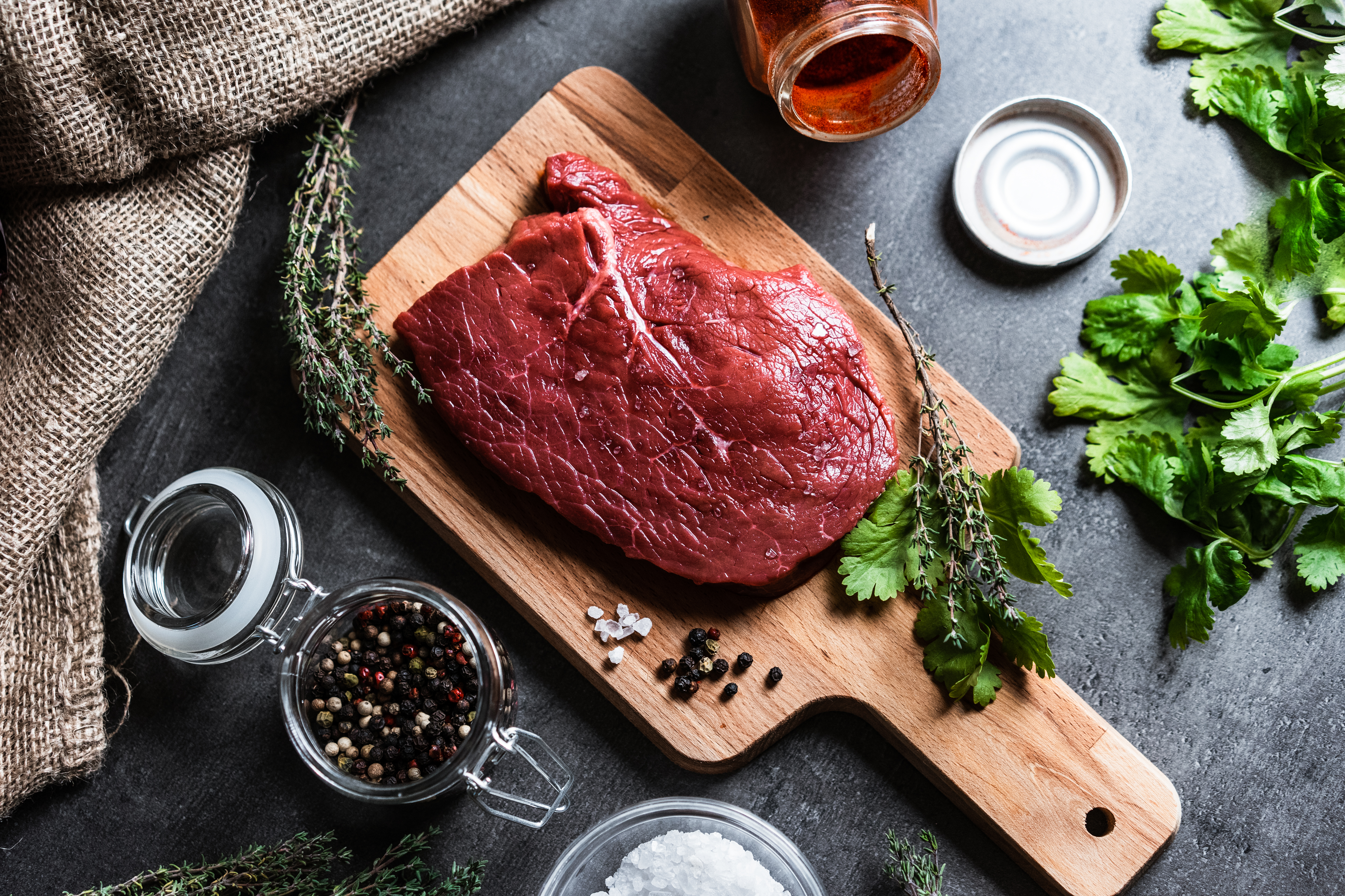 Browse Free HD Images of Raw Red Meat Lays In A Wooden Cutting Board