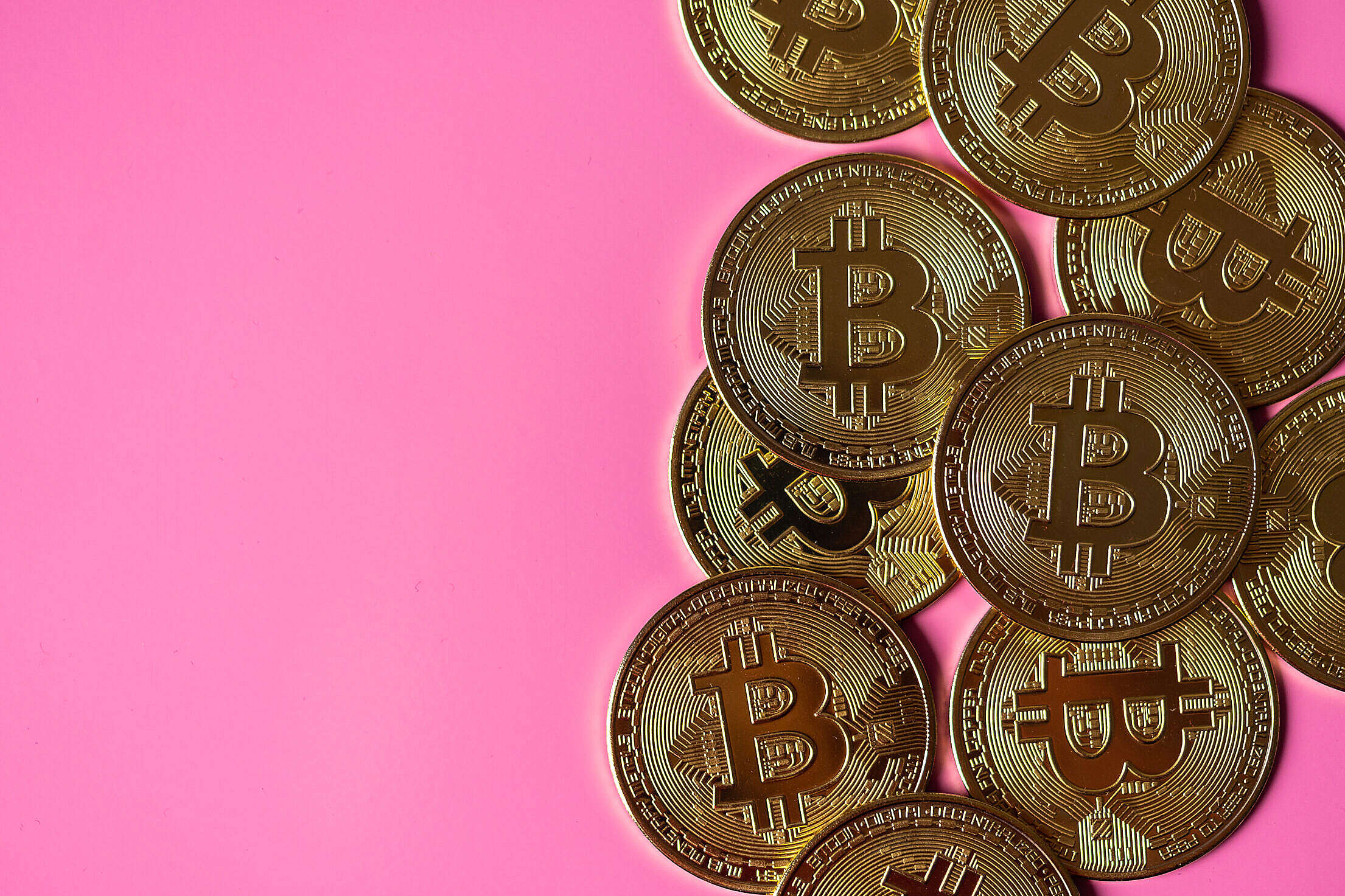 Bitcoin Coins on Pink Background Free Stock Photo