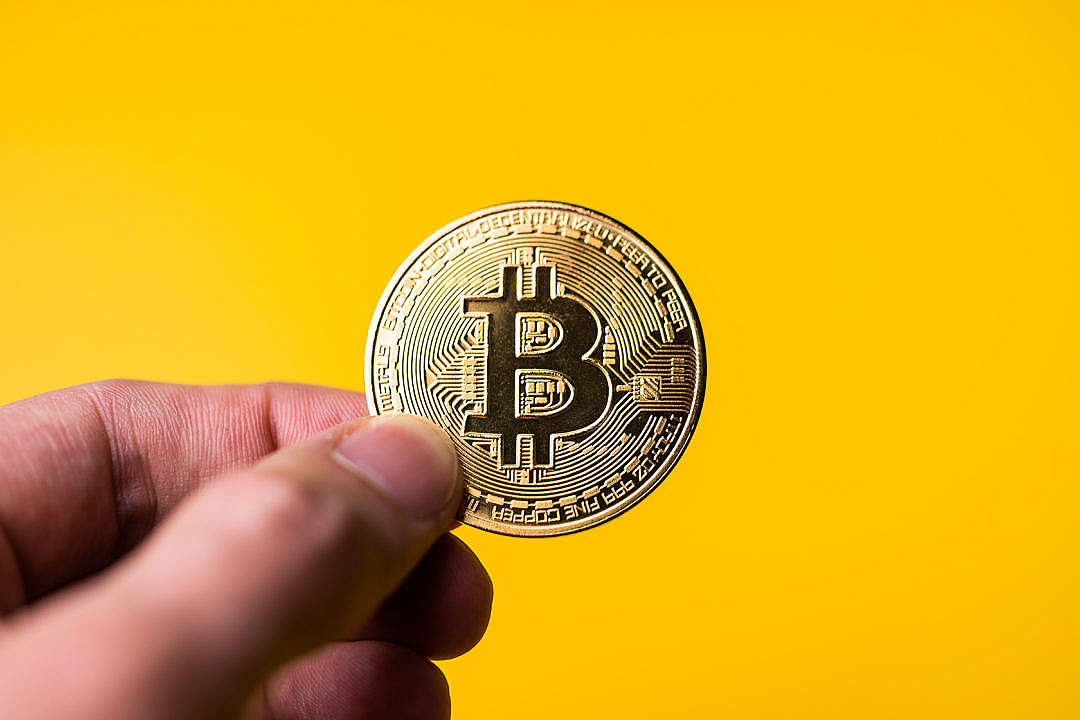 Download Bitcoin Golden Coin on Yellow Background FREE Stock Photo