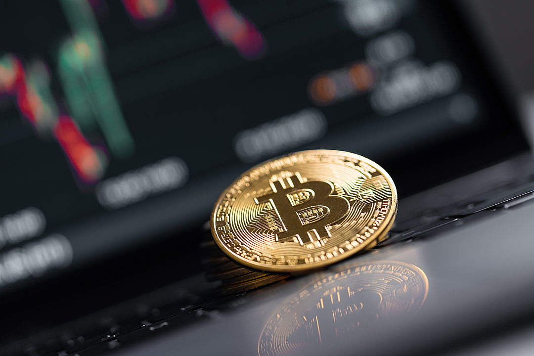 Download Bitcoin Reflection on a Laptop Gloss FREE Stock Photo