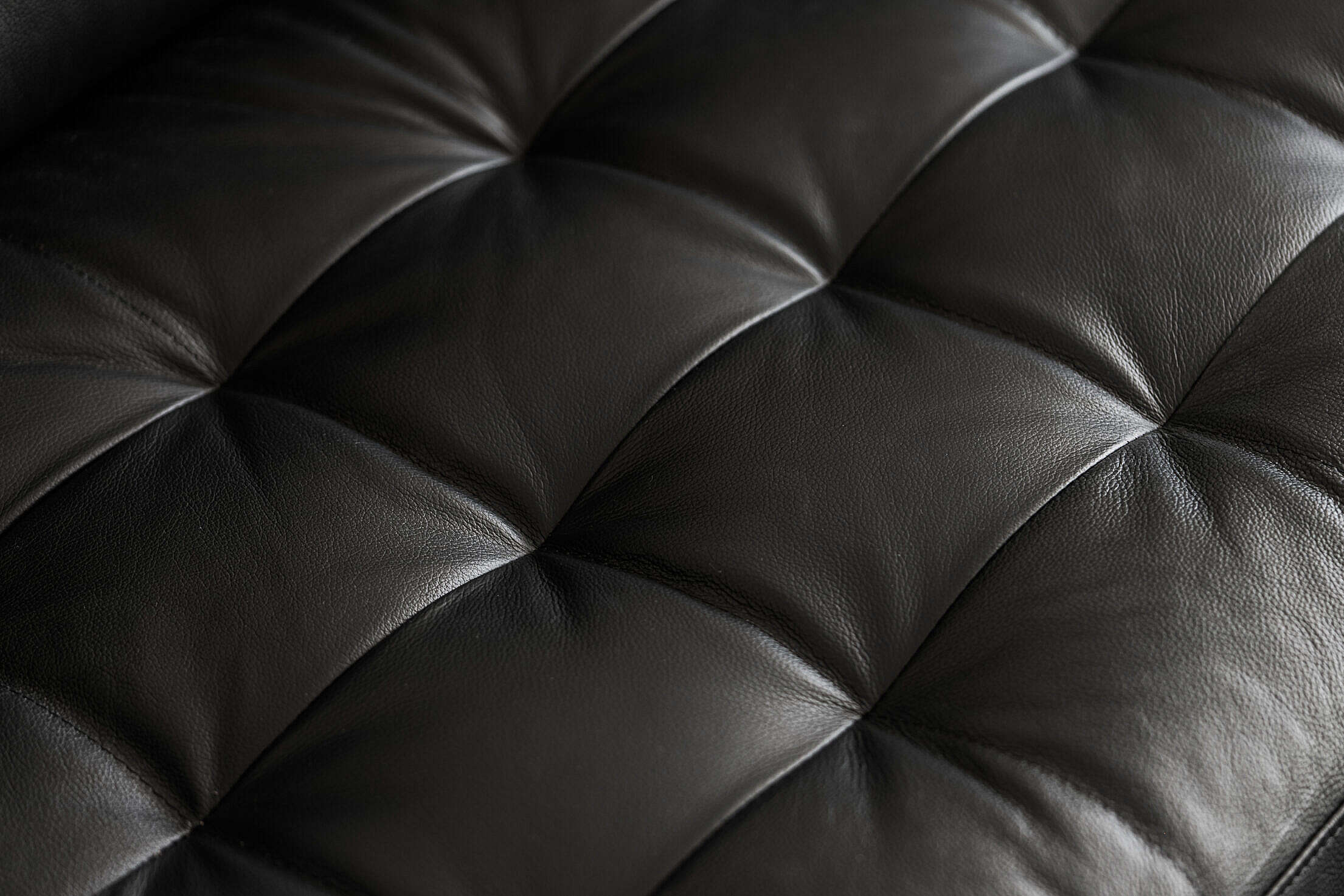 Black Leather Seat Sofa Minimalistic Background Free Stock Photo | picjumbo