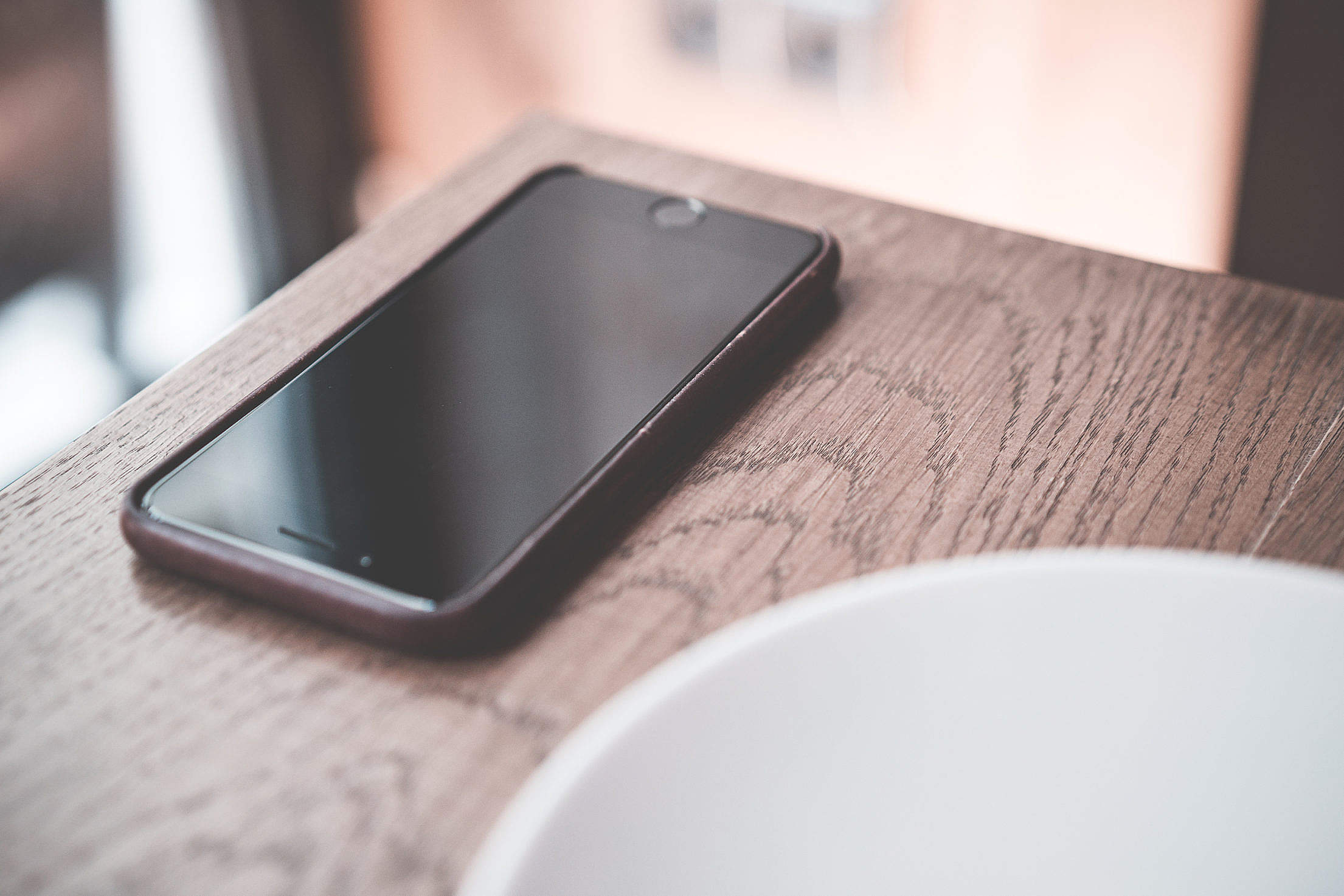 Black Smartphone on Wooden Table in Café Free Stock Photo | picjumbo