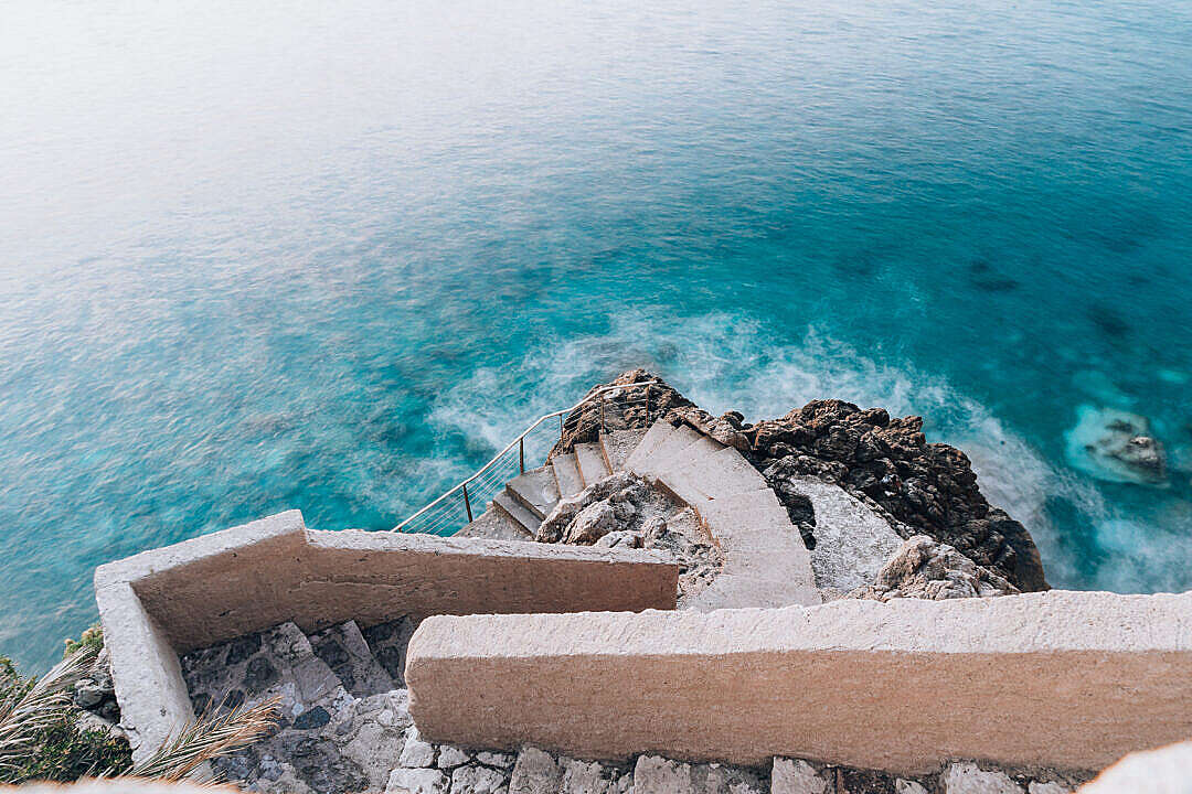 Download Blue Mediterranean Sea Coast with Stairs FREE Stock Photo
