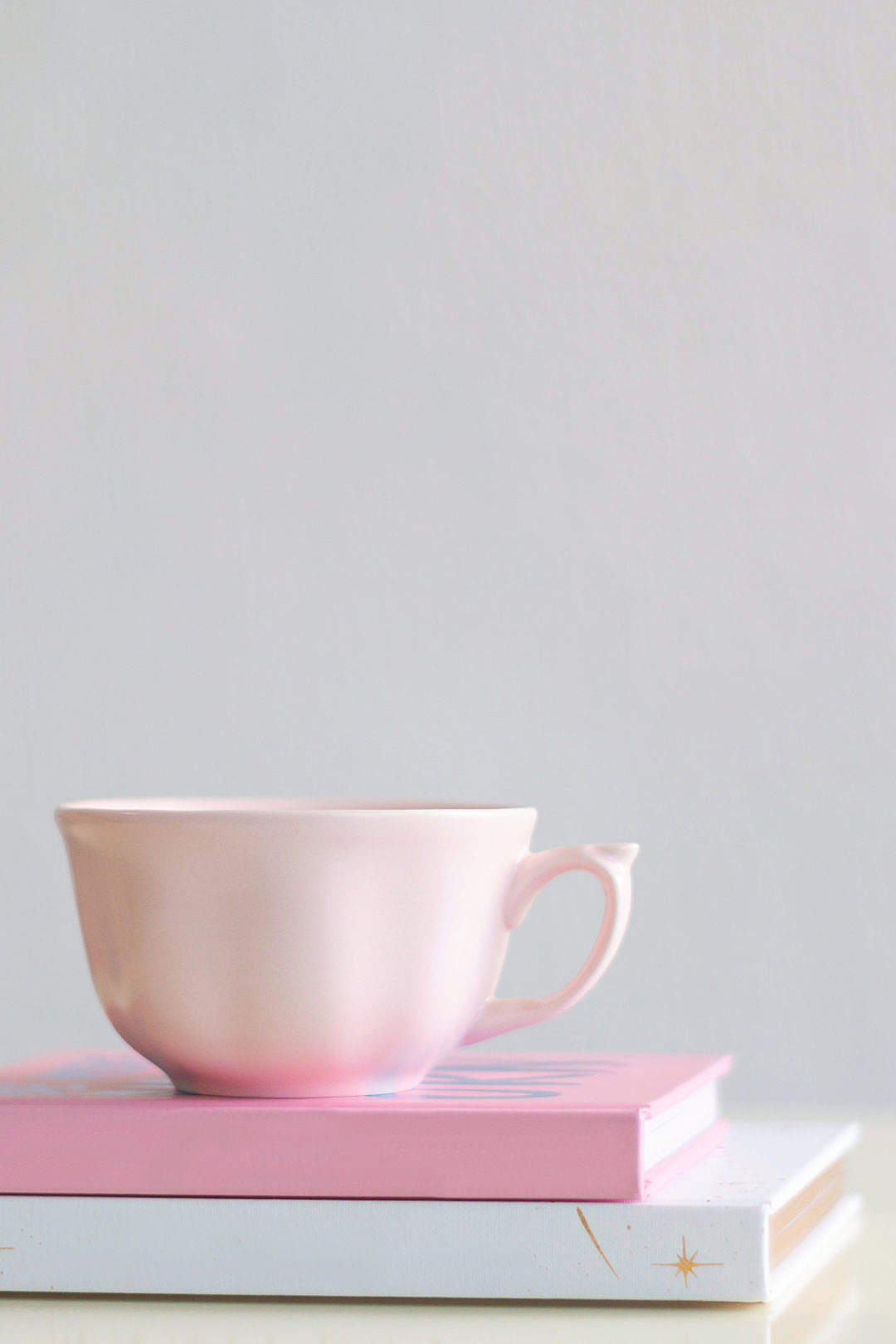 Books and a Vintage Cup