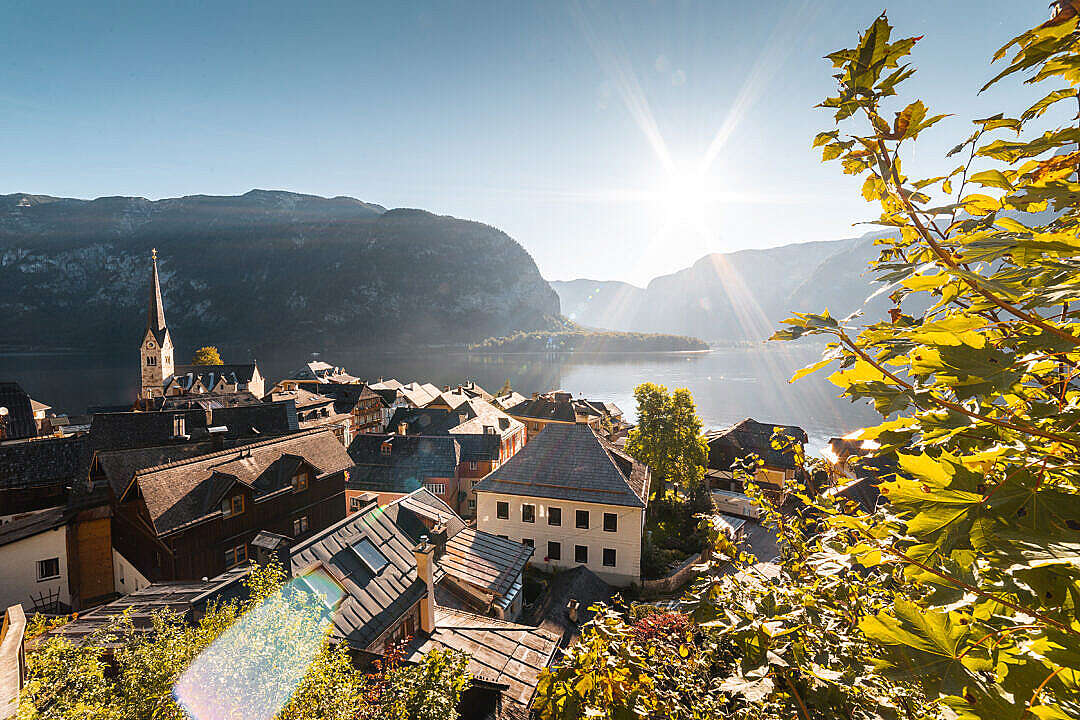 Download Bright Sunbeams Above Houses in Hallstatt, Austria FREE Stock Photo