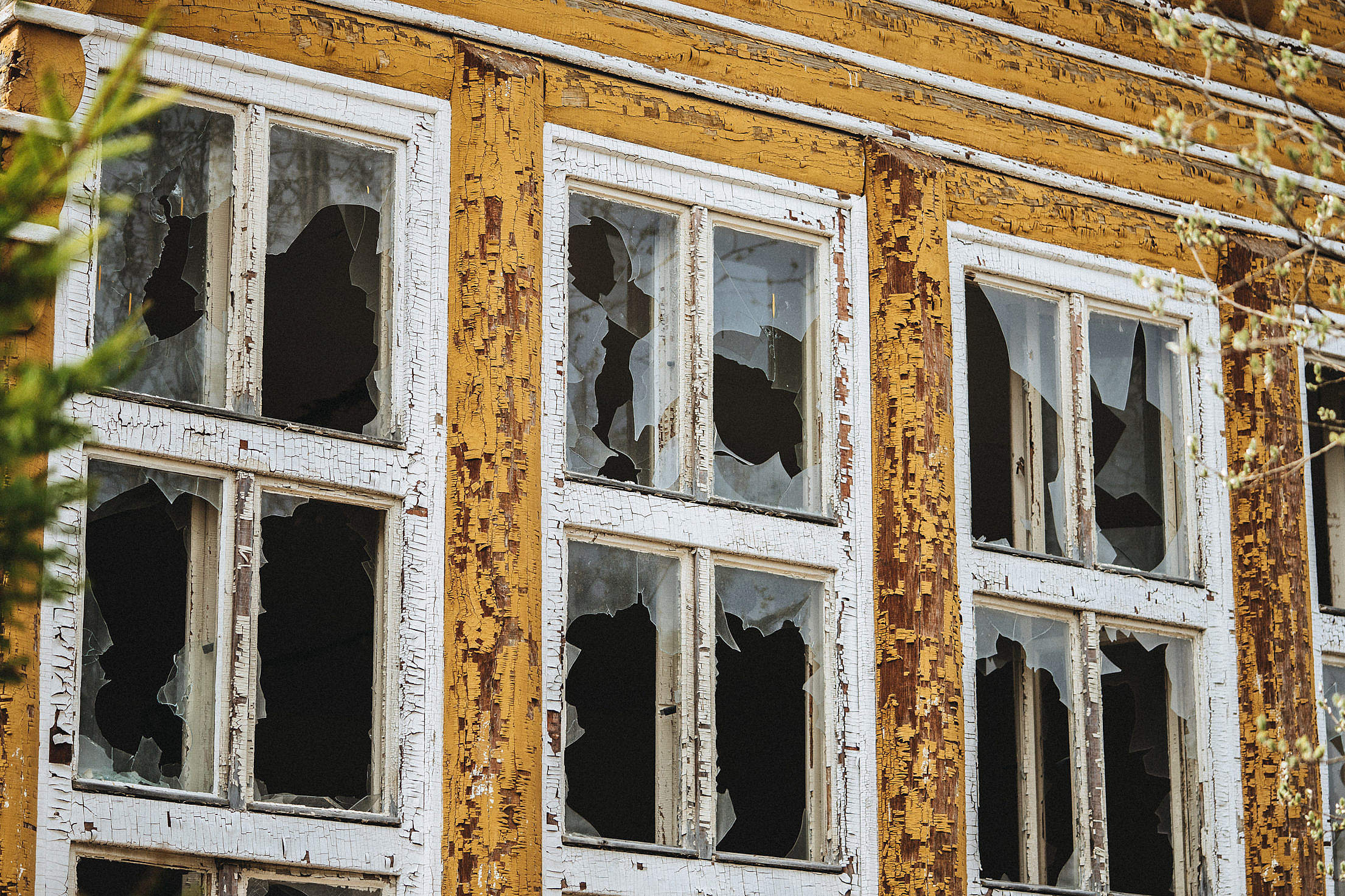 Broken Windows in an Old Abandoned Building Free Stock Photo