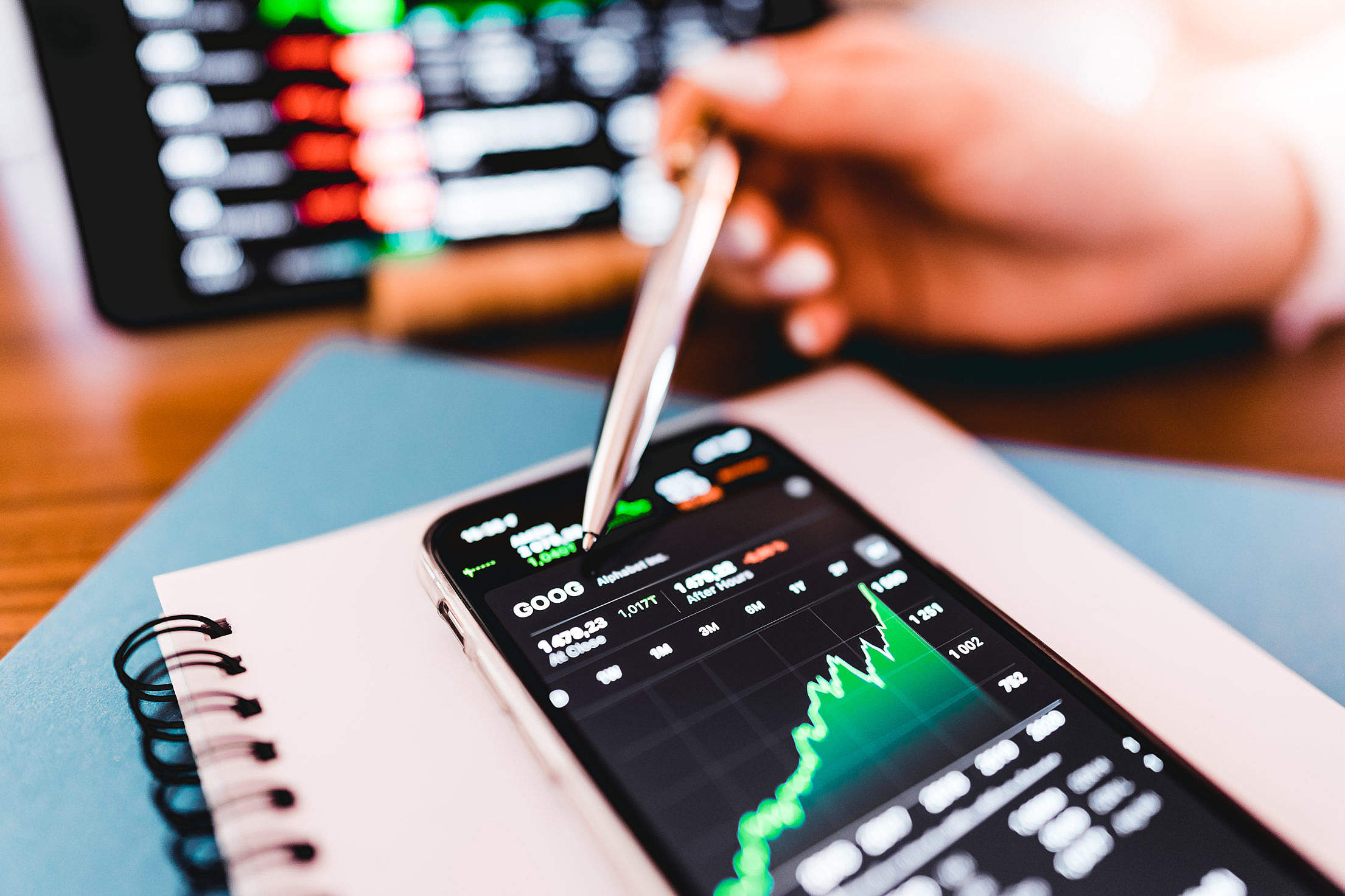 Business Woman Pointing at GOOG Stocks Free Stock Photo picjumbo