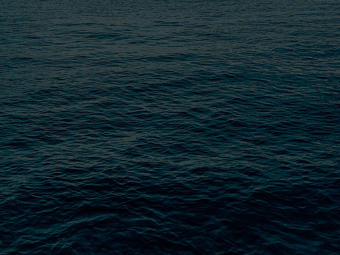 Download Calm Dark Blue Sea Background FREE Stock Photo