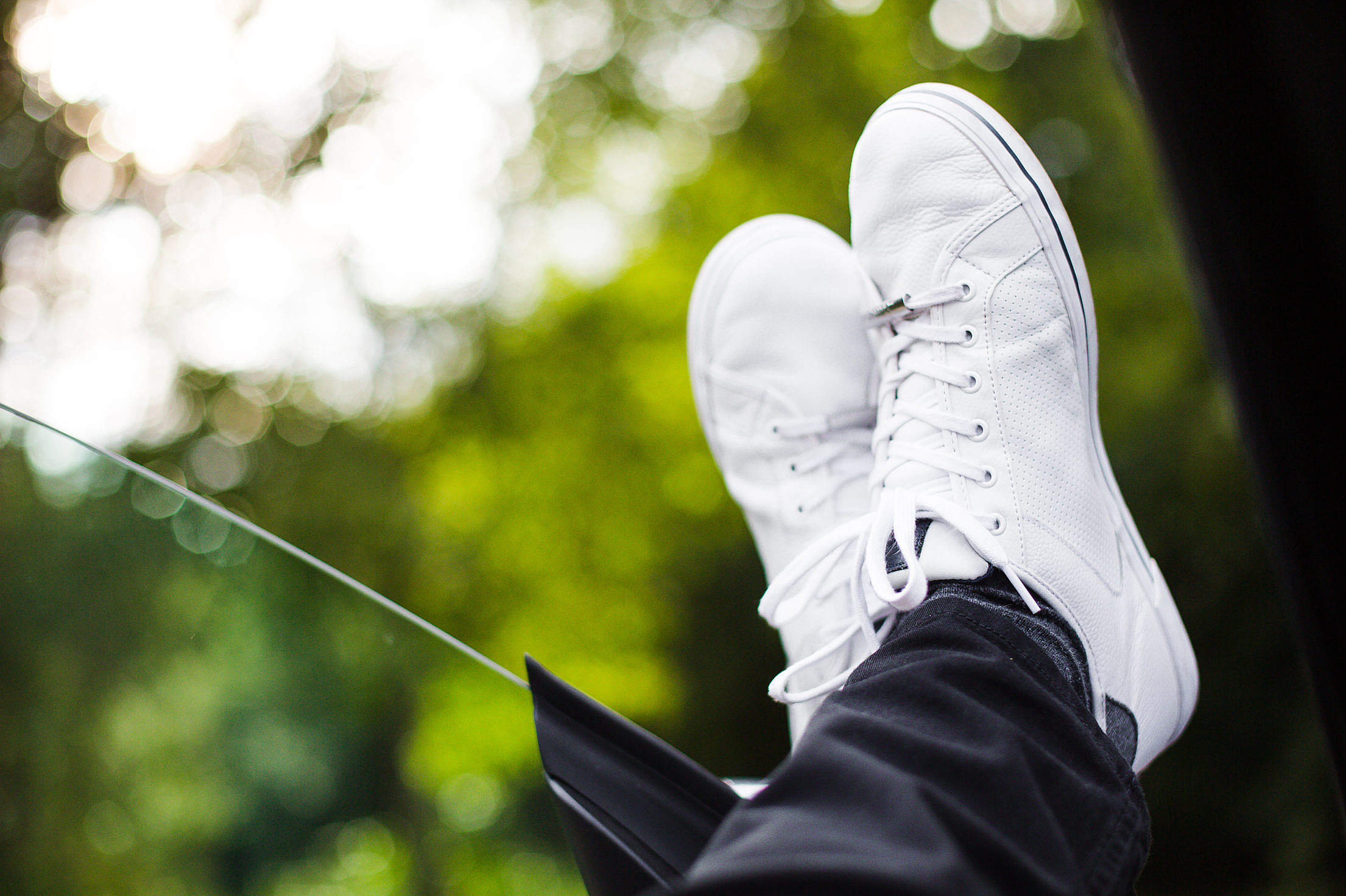 Chilling Out With White Sneakers On Free Stock Photo