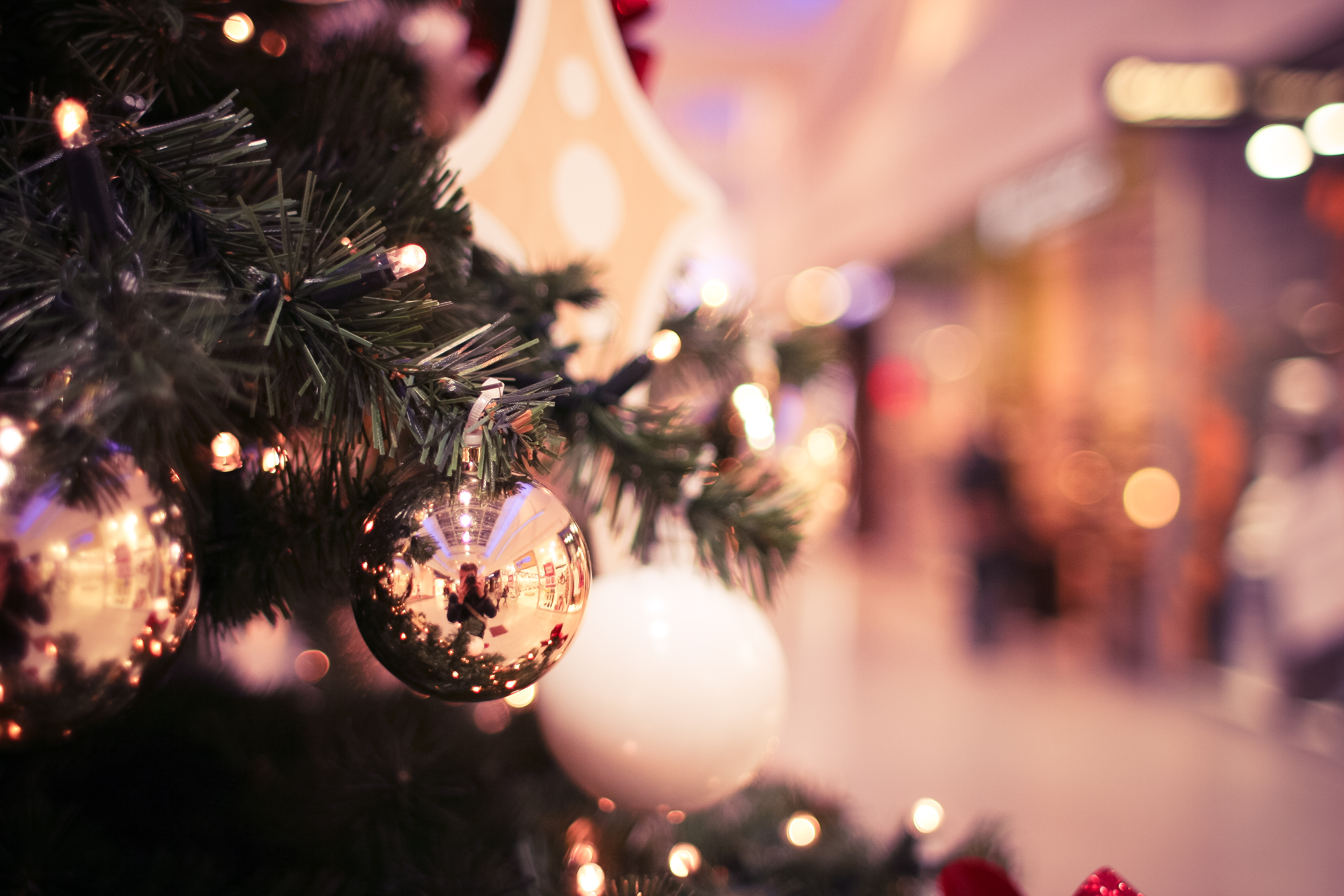Premium Photo  Christmas tree decoration shopping bag with blurred bokeh  background