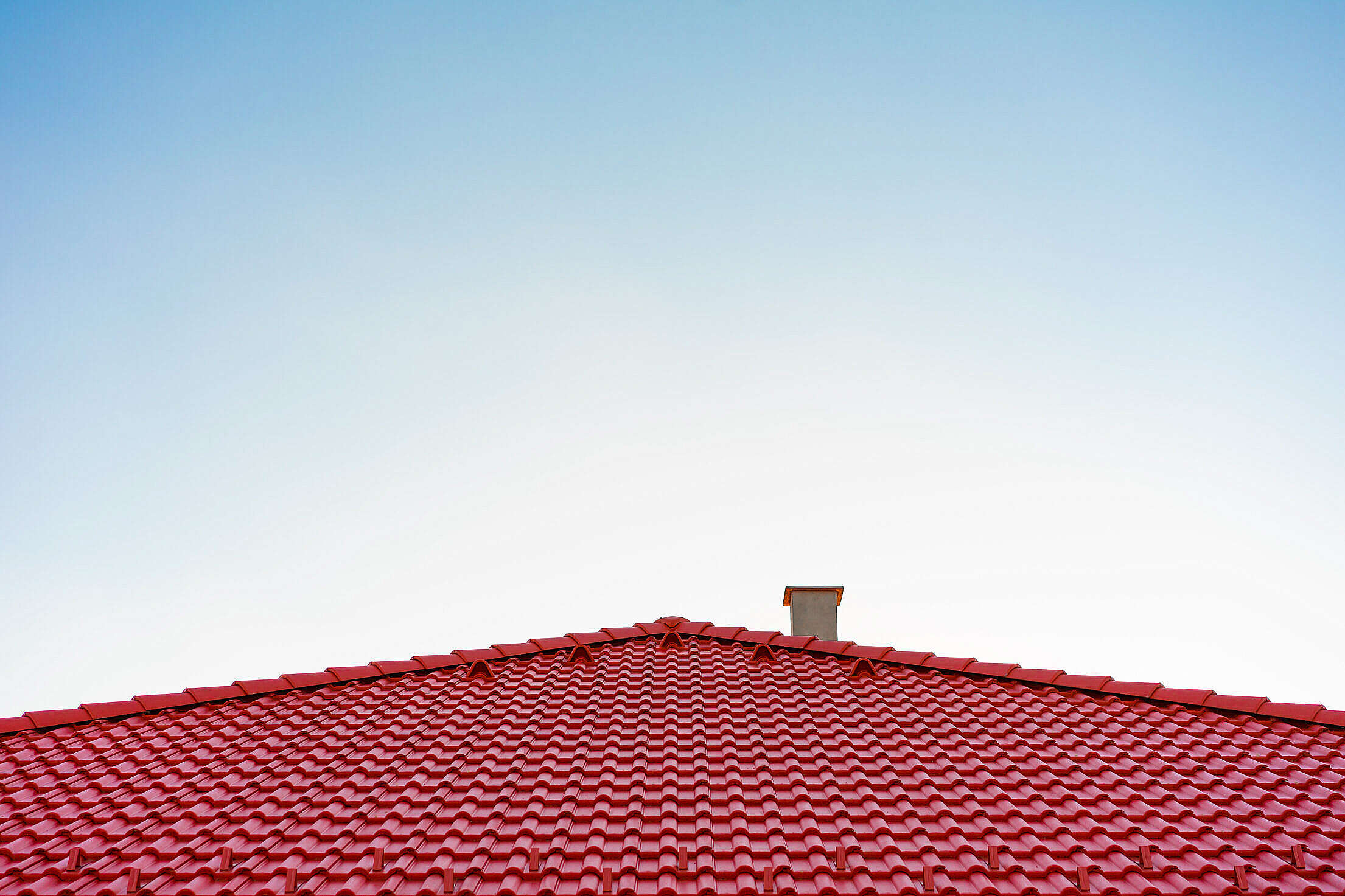 Classic European Red Roof with Chimney Free Stock Photo