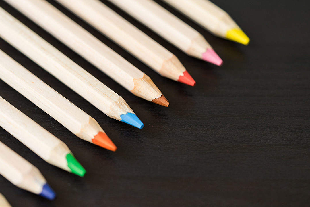 Download Colored Pencils in a Row with Room for Text FREE Stock Photo