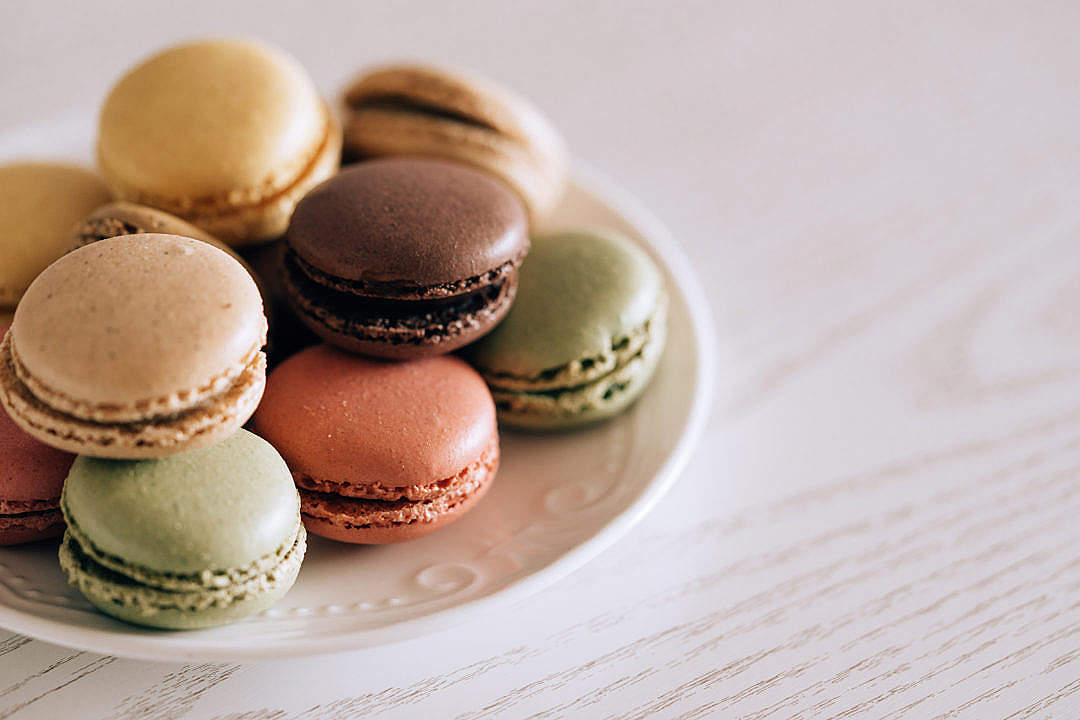 Colorful Macarons on a Vintage Plate