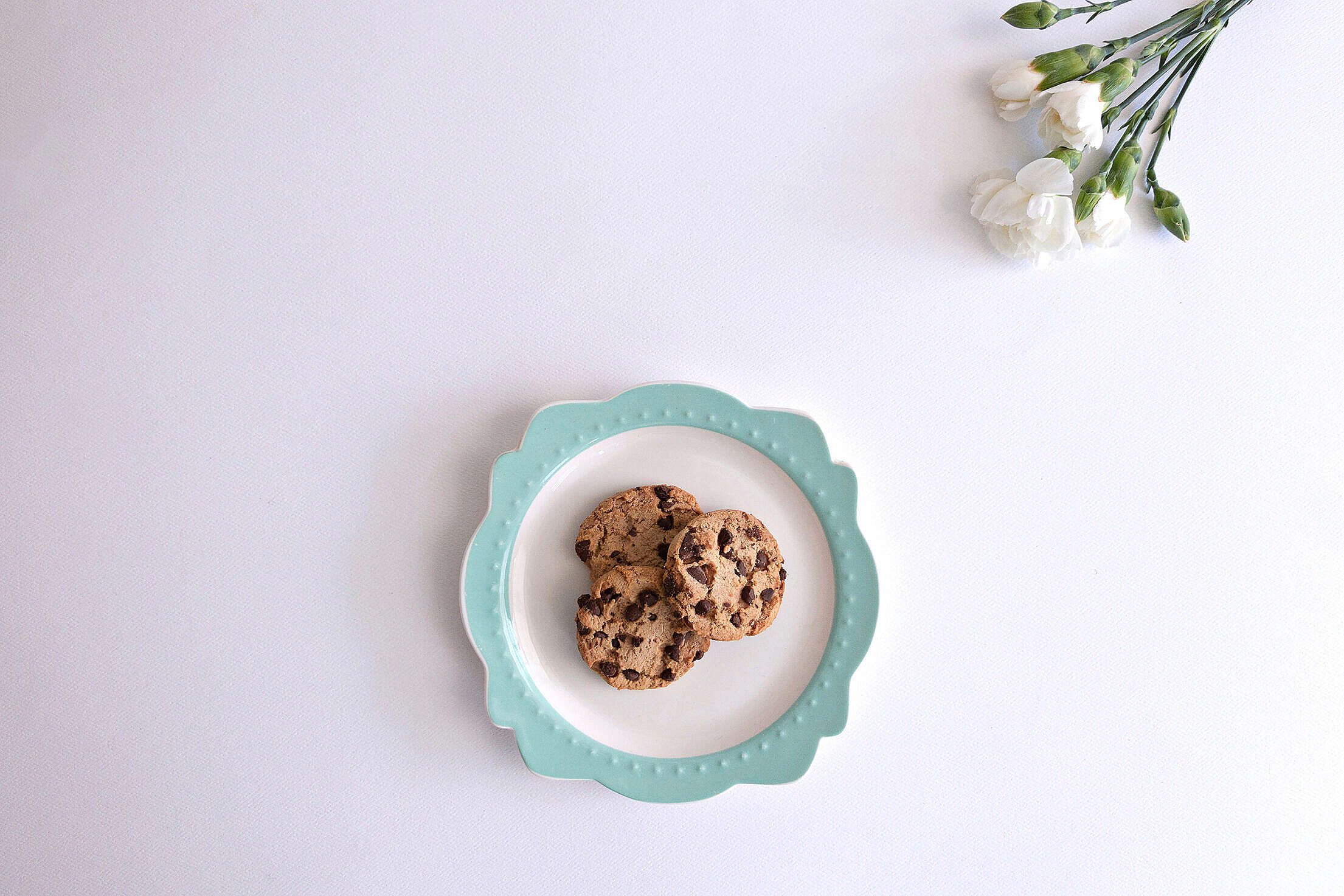 Cookies Served on a Vintage Plate with Flowers Free Stock Photo