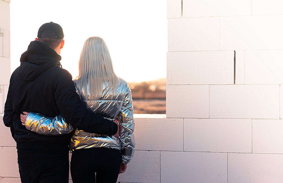 Couple Standing in Their Future House