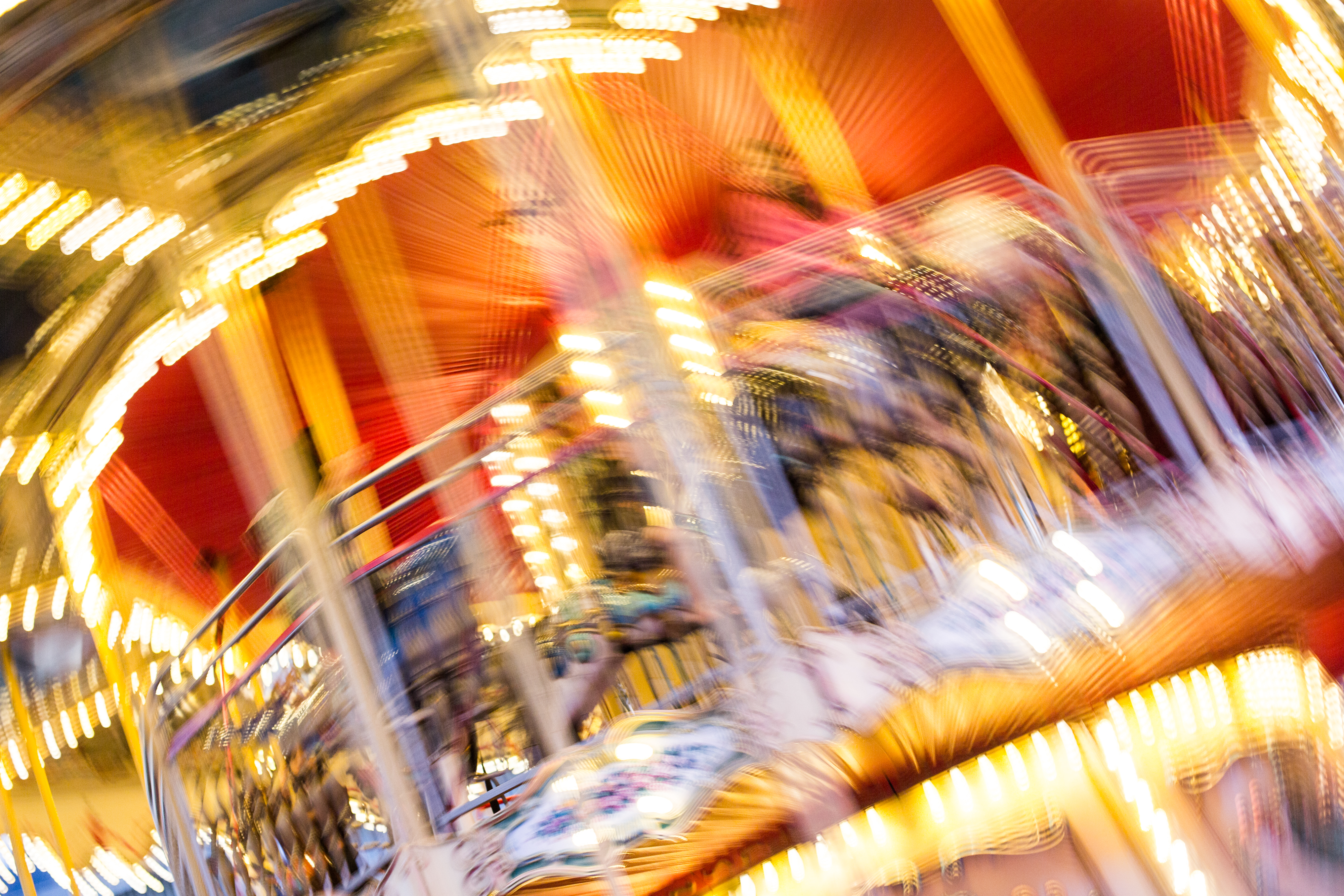 Crazy Blurred Carousel at Night Free Stock Photo