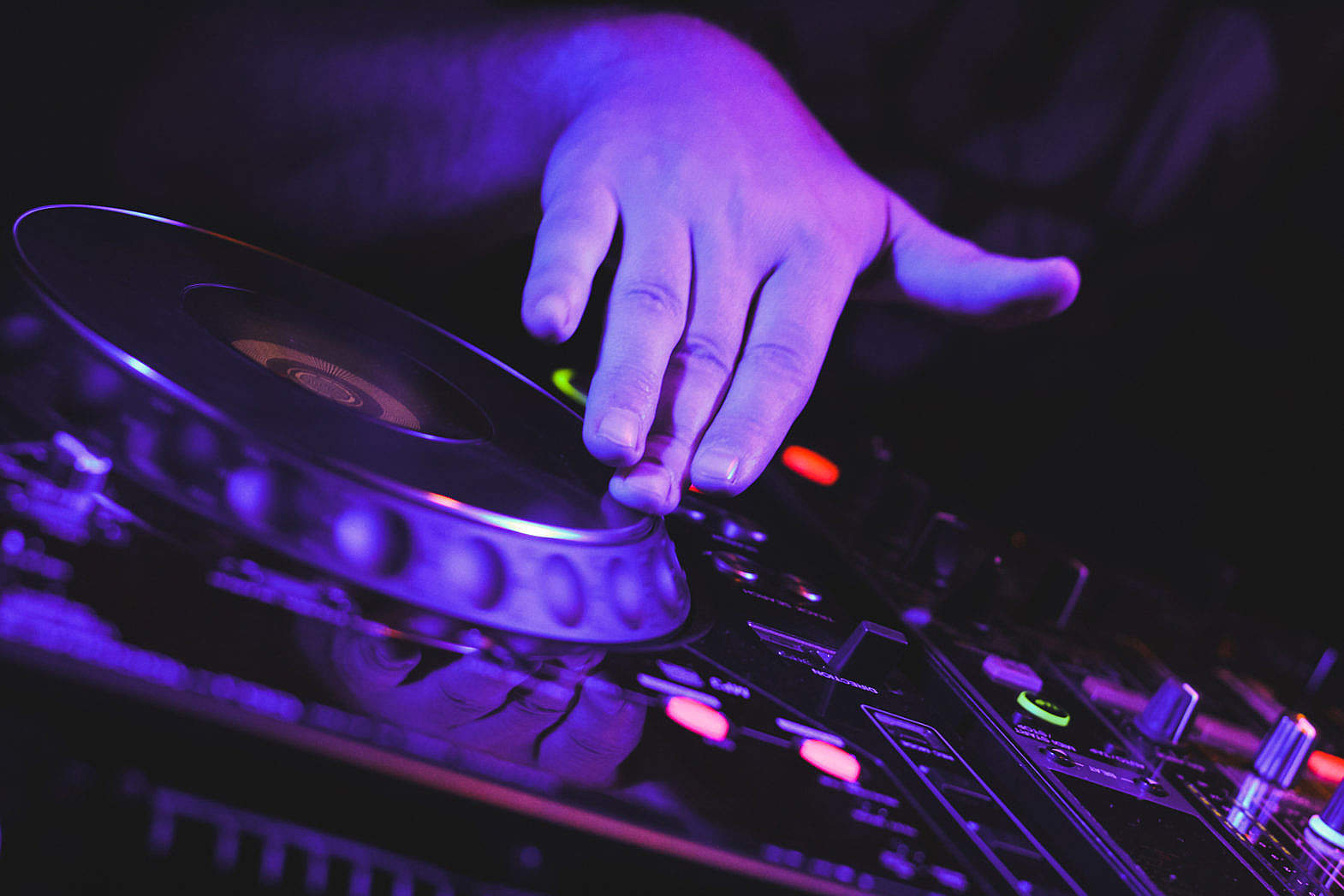 DJ's Scratching on CD Players Hand Close Up Free Stock Photo | picjumbo