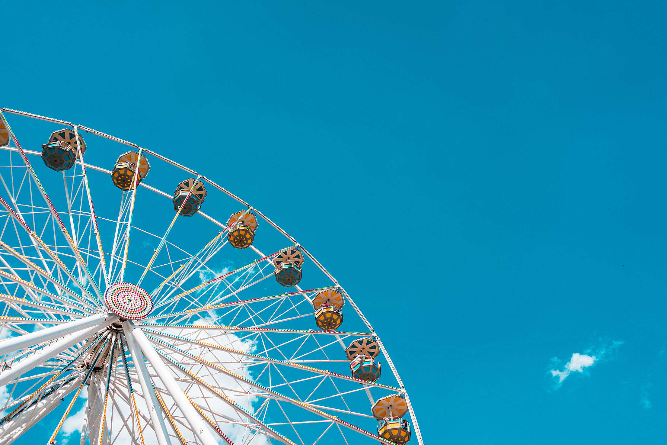 Ferris Wheel Amusement Park with Place for Text Free Stock Photo