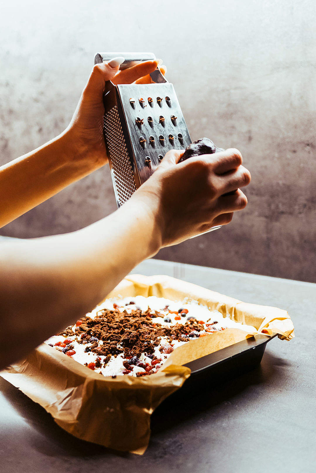 Download Finishing Fruit Cake with Chocolate Streusel FREE Stock Photo