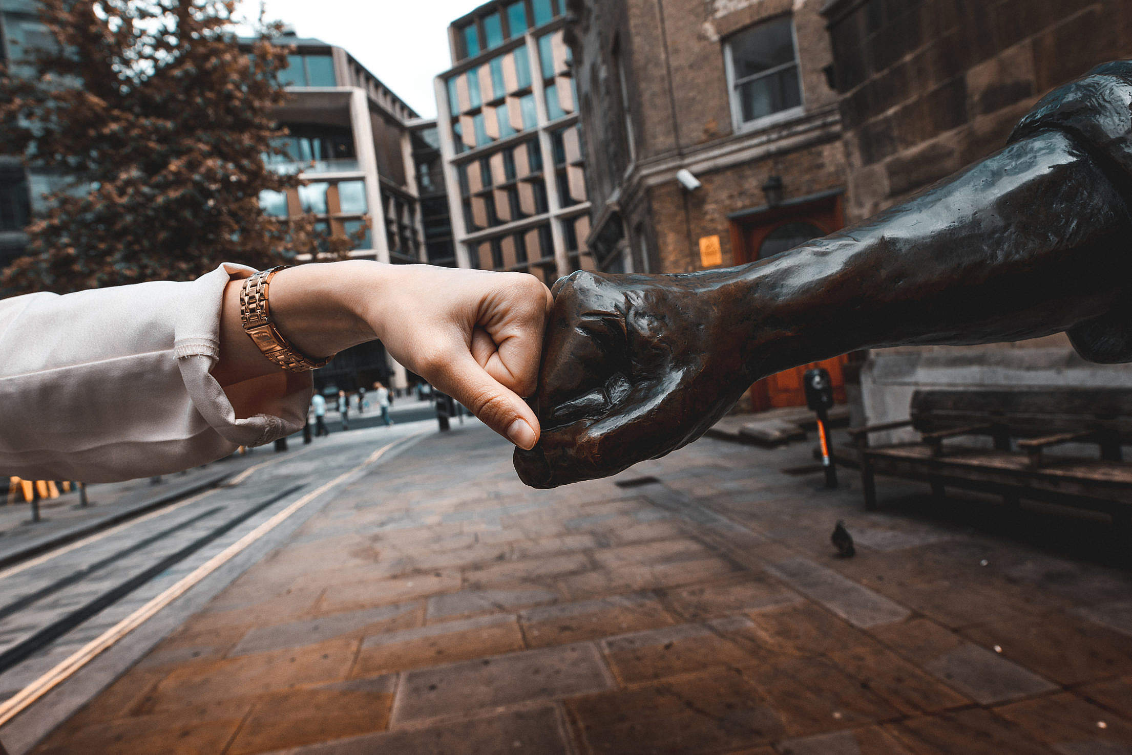 Download Fist Bump with Cordwainer Statue, London Free Stock Photo