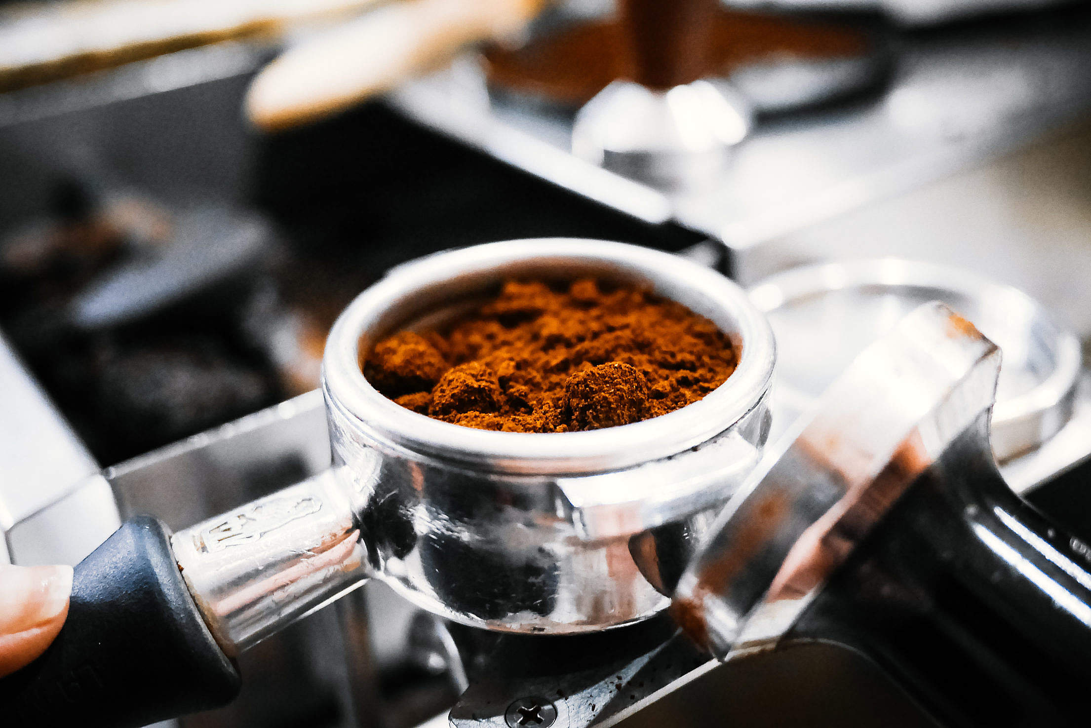 Freshly Ground Coffee from Coffee Grinder #2 Free Stock Photo