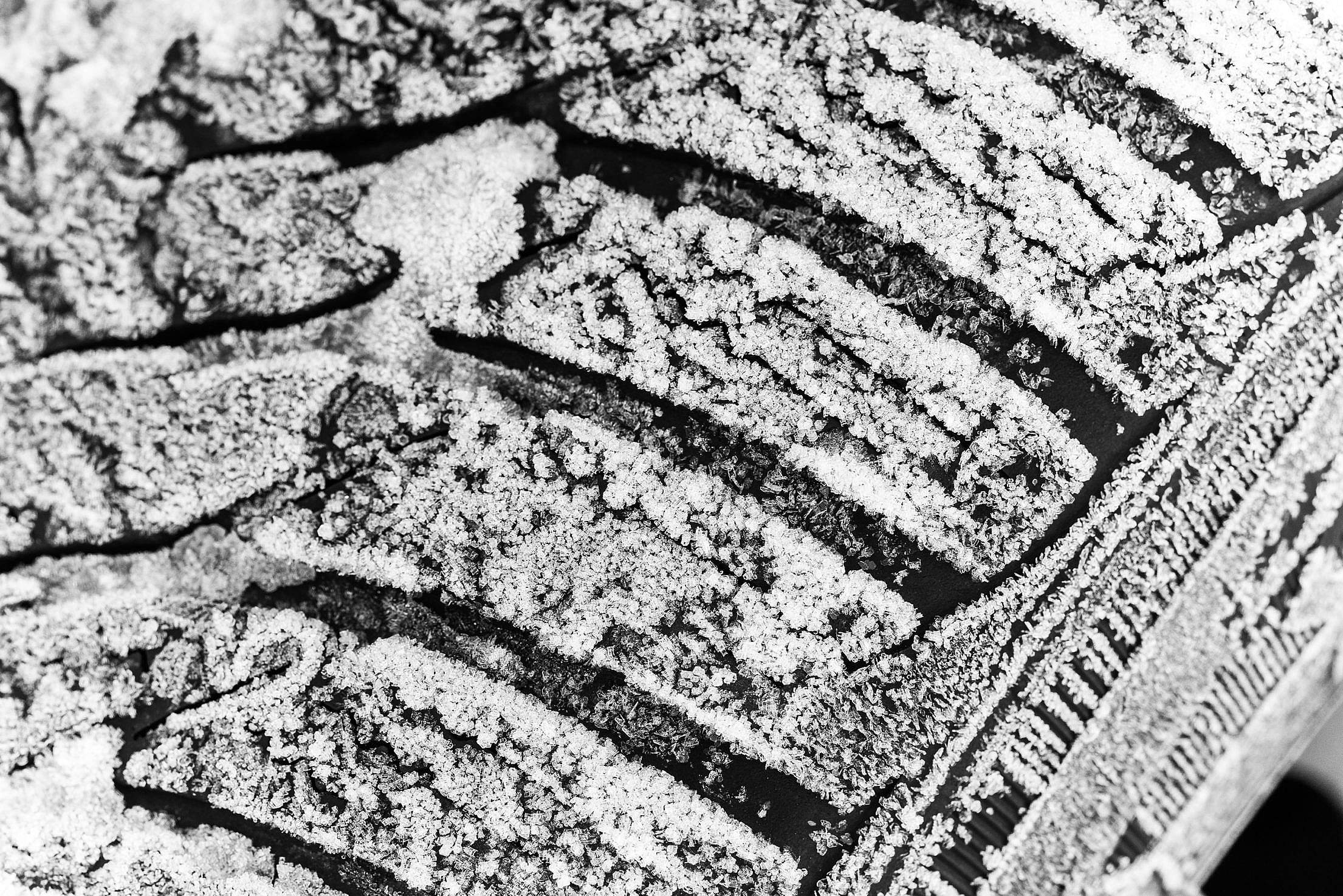 Frozen Winter Tire With Snow Close Up Free Stock Photo