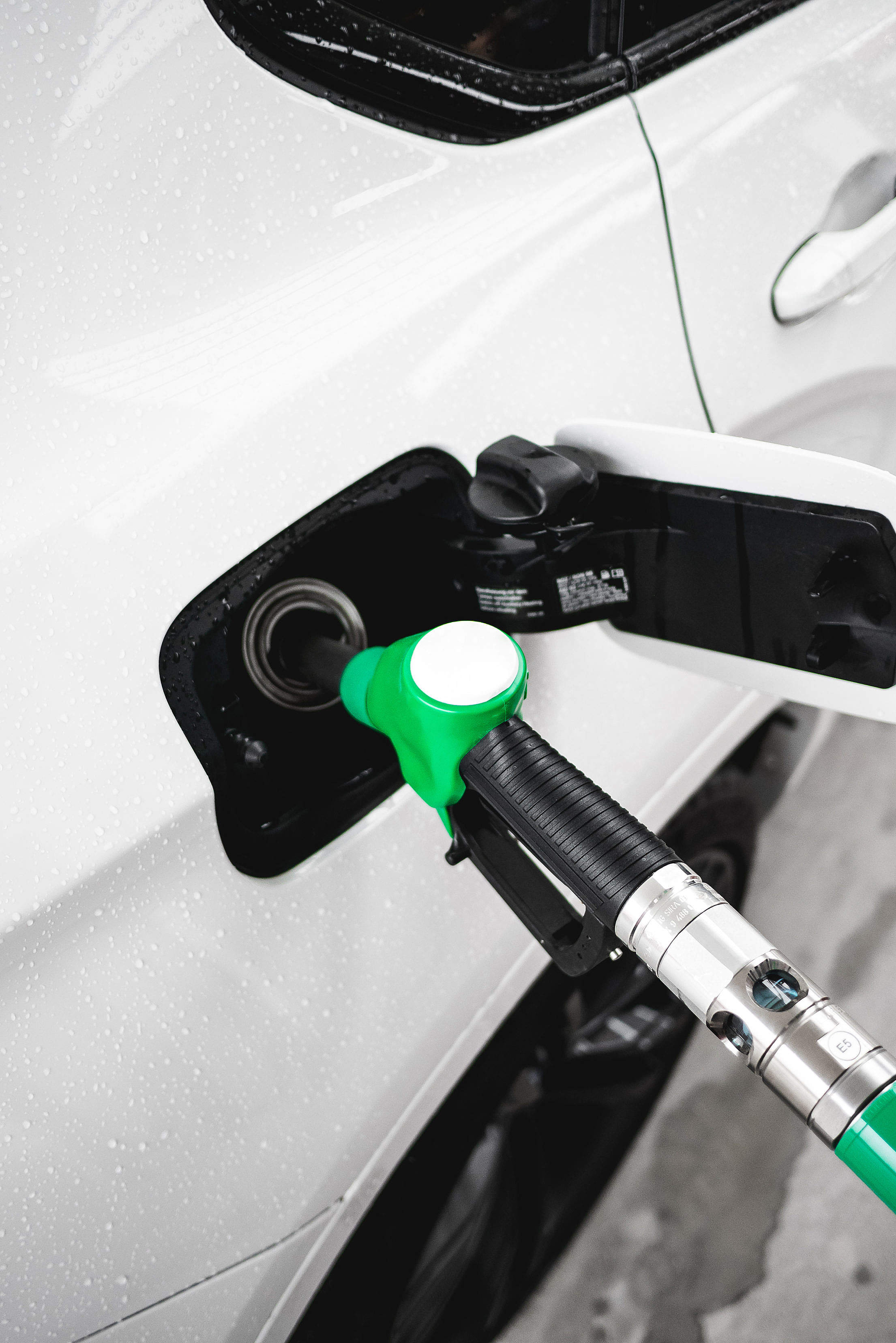 Fueling a Car Expenses Free Stock Photo
