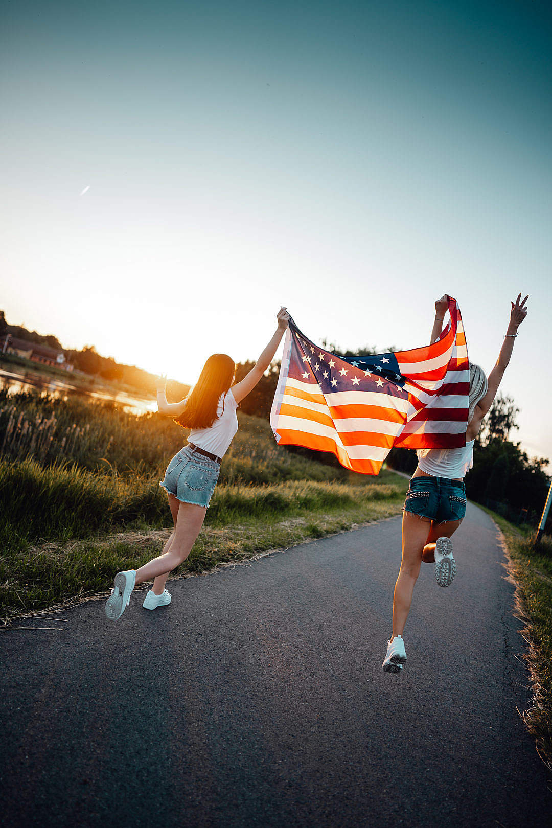 Girls Dancing with an American Flag