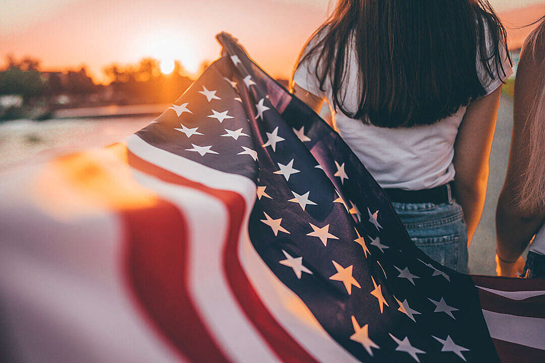 Girls Holding an American Flag