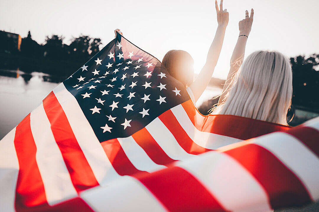 Girls Holding USA Flag