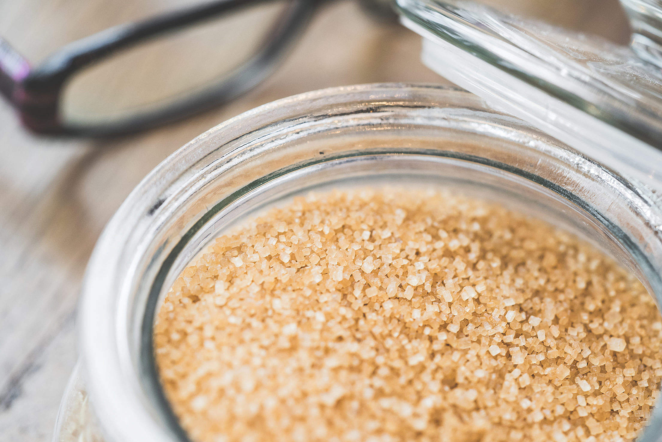 Glass Bowl with Brown Cane Sugar Close Up Free Stock Photo