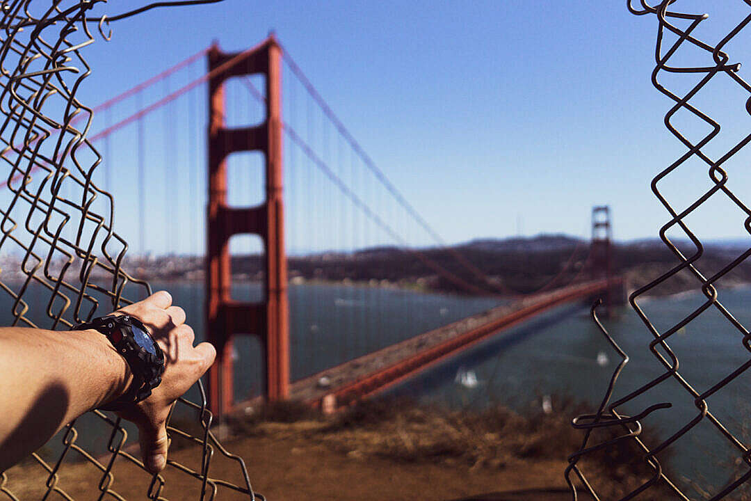 Golden Gate Bridge Through a Hole in a Fence