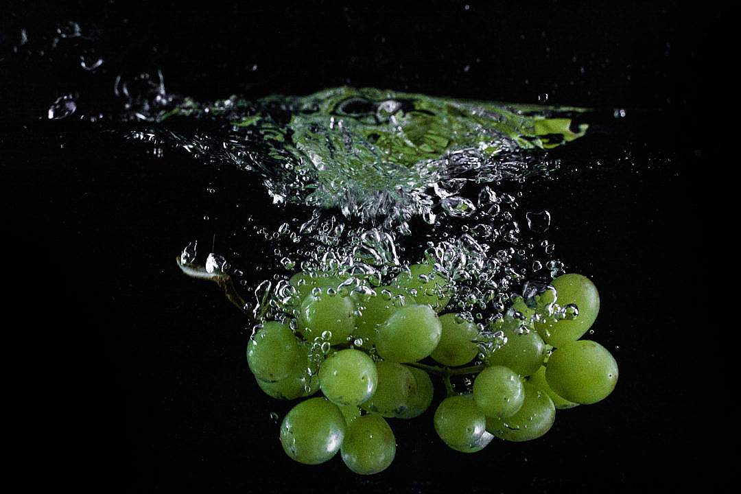 Download Grapes Thrown in Water FREE Stock Photo