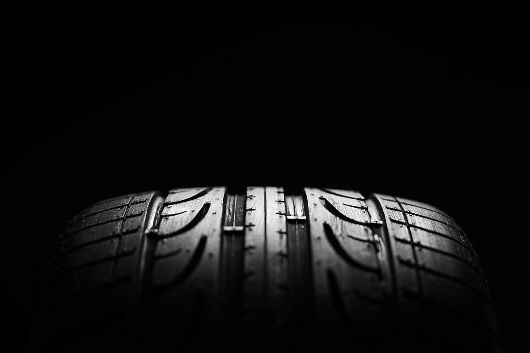 Download High-performance Sport Summer Car Tire Close-up FREE Stock Photo