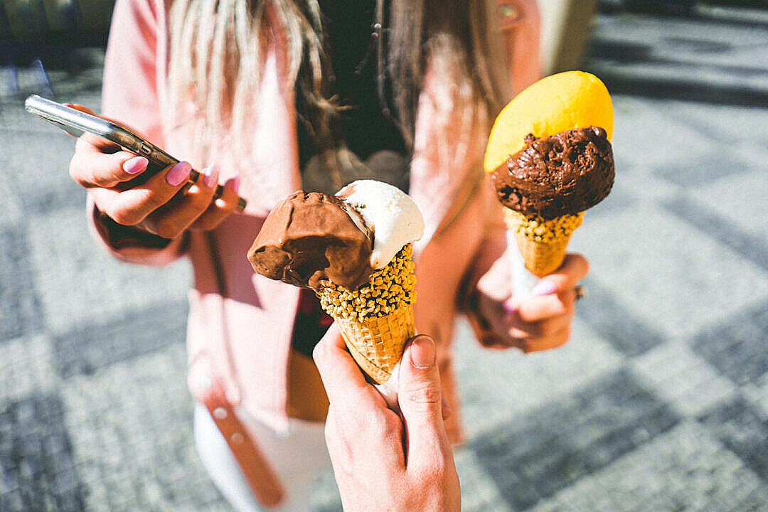 Download Holding an Ice Cream FREE Stock Photo