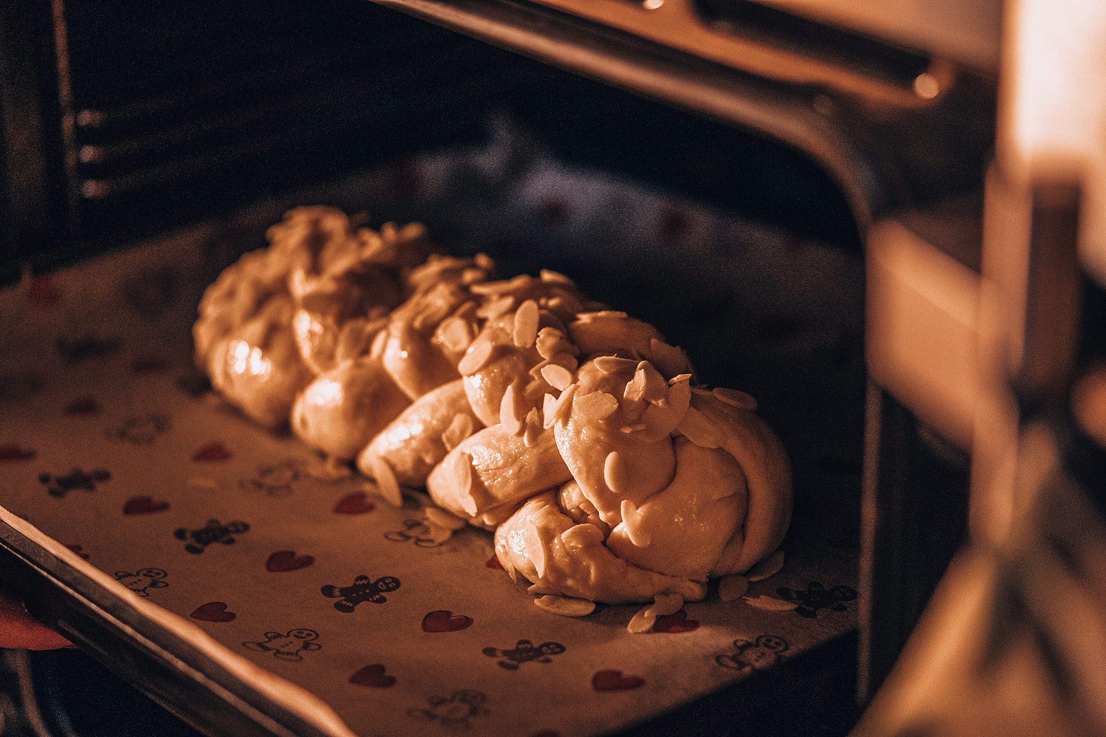 Homemade Braided Sweet Bread in the Oven Free Stock Photo