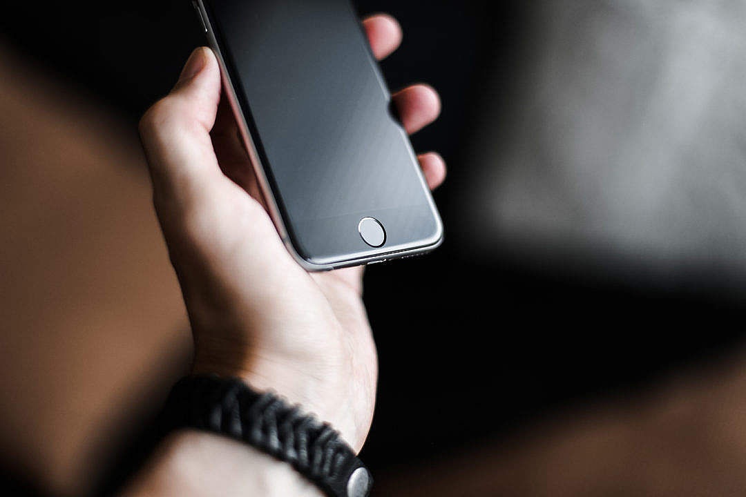 Download iPhone 6 in Hand FREE Stock Photo