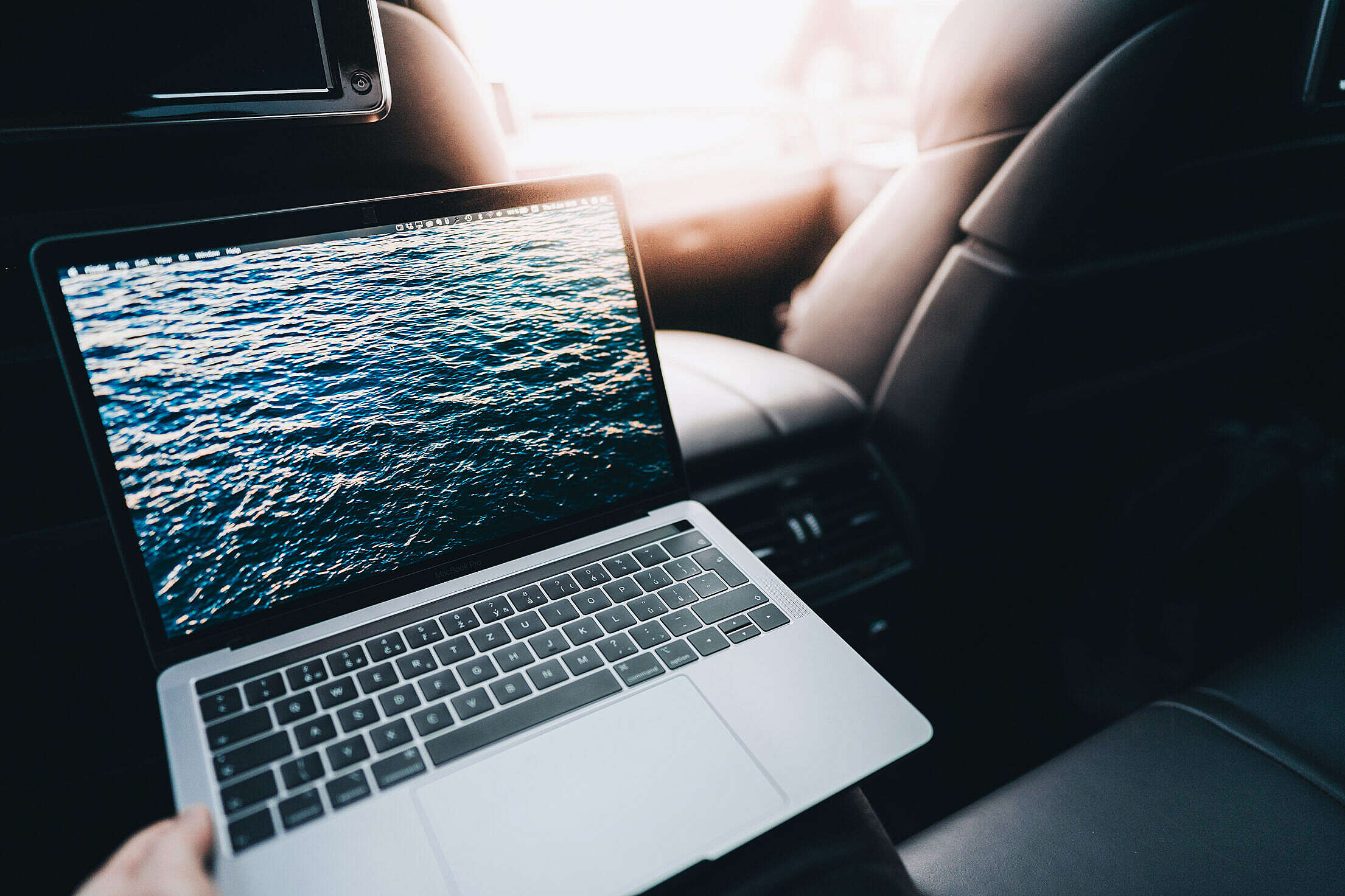 Laptop in The Car Free Stock Photo