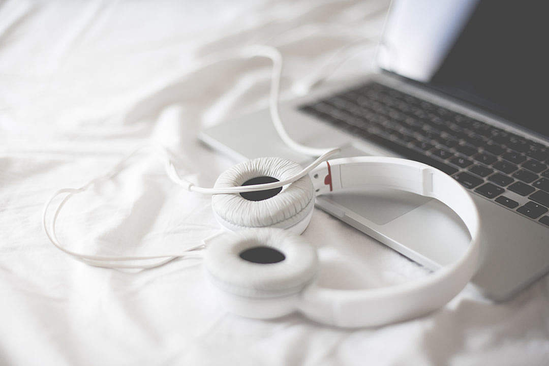 Download Listening to Music in a Bed FREE Stock Photo