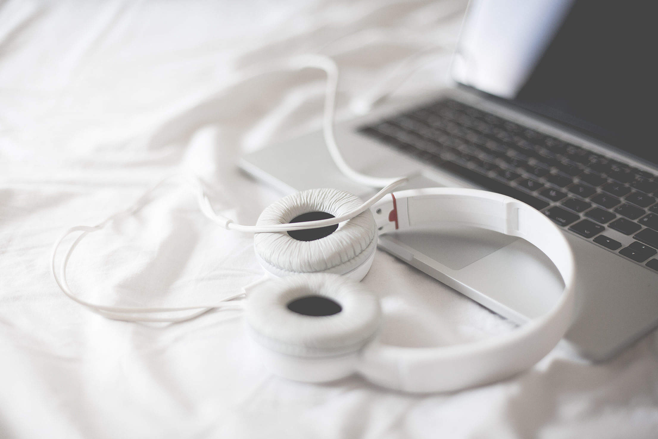 Listening to Music in a Bed Free Stock Photo