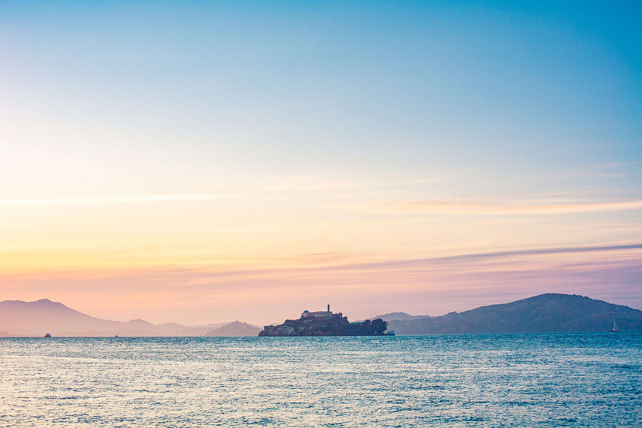 Lonely Alcatraz Island in The Middle of San Francisco Bay Free Stock Photo