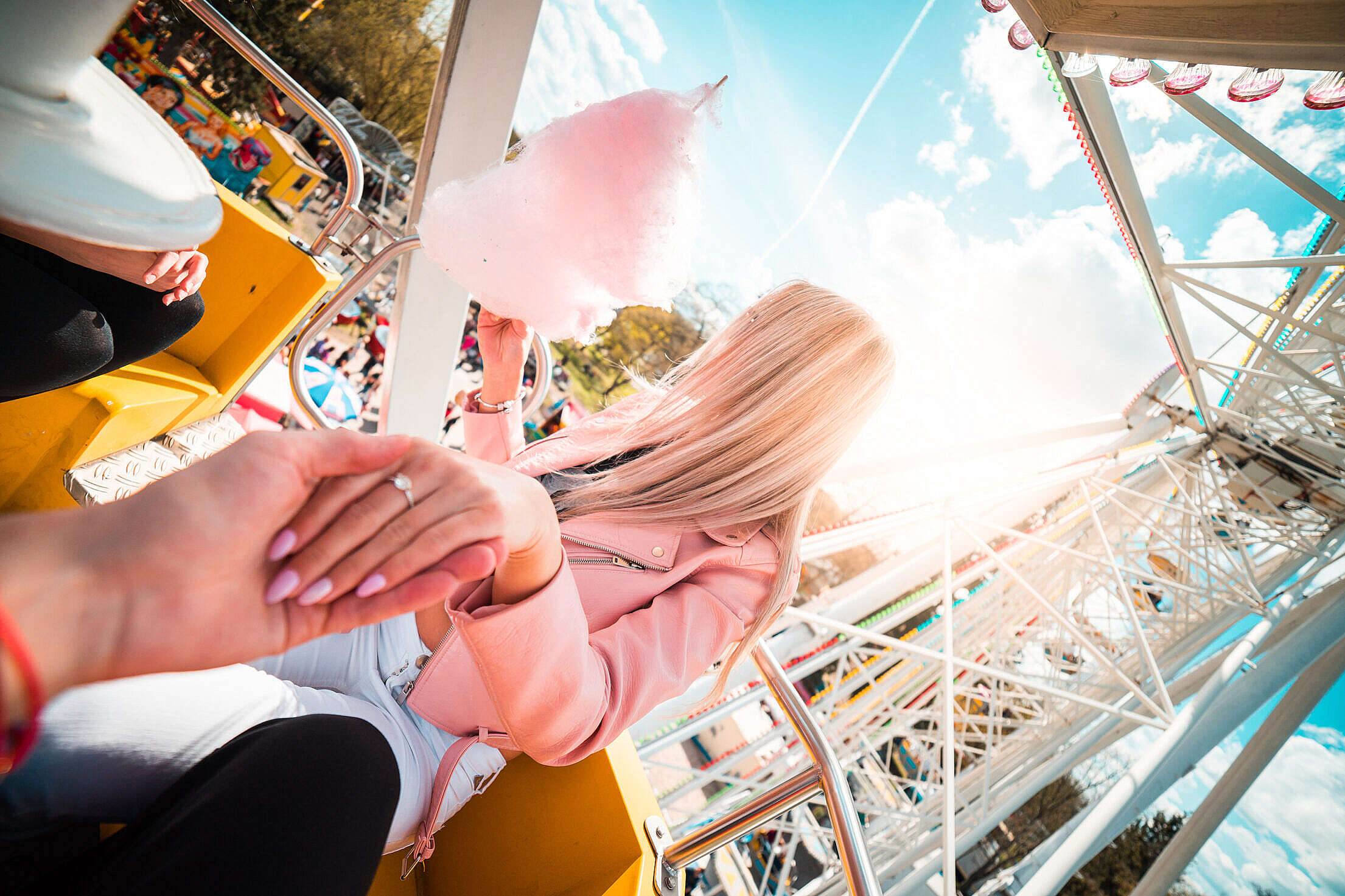 Lovely Couple Dating on a Ferris Wheel Free Stock Photo