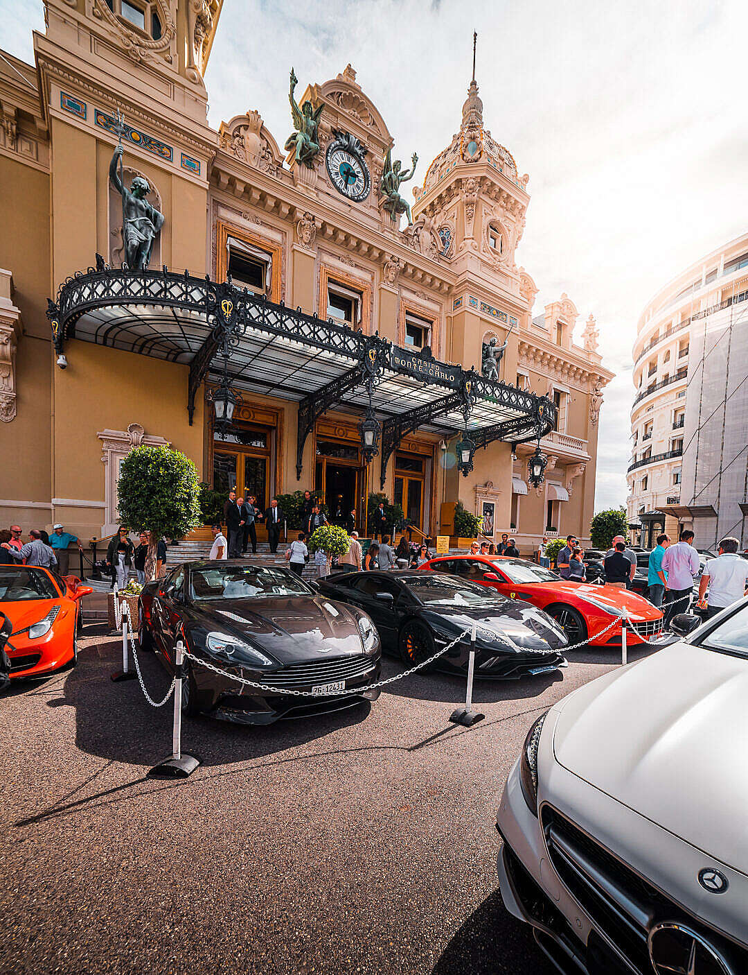 Luxury Cars and Tourists in front of Monaco Casino