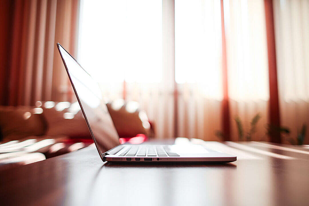 Download MacBook Pro from the Left Side FREE Stock Photo