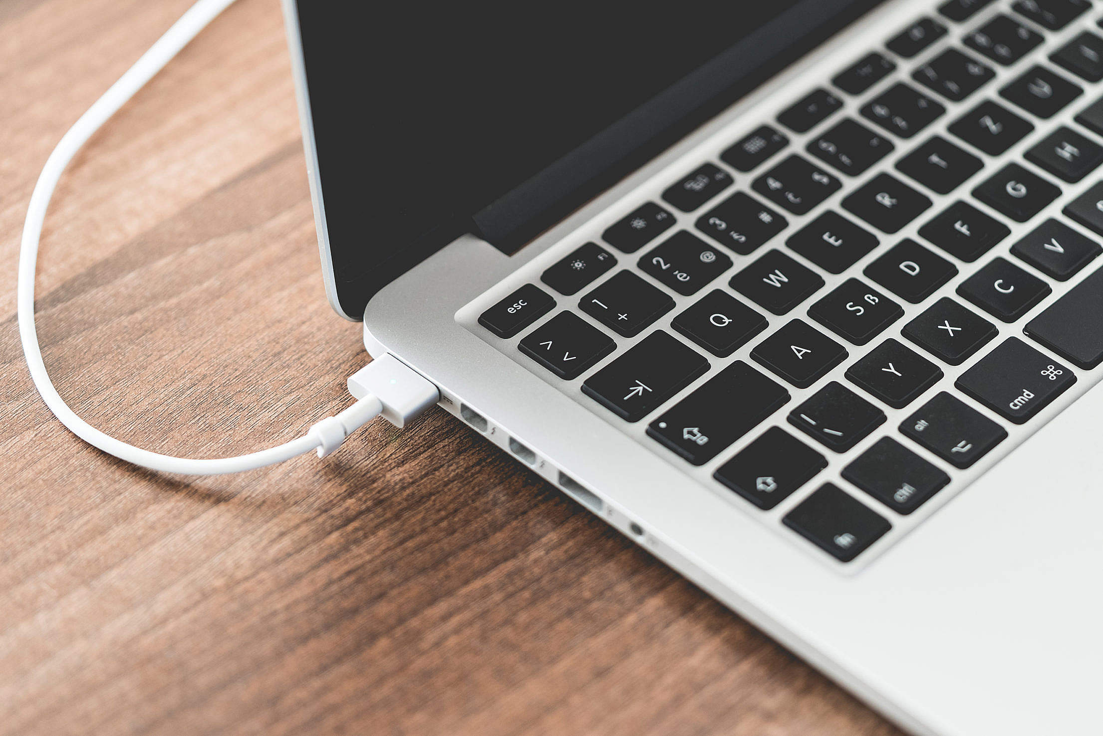 MagSafe Charging Cable and MacBook Laptop Ports Free Stock Photo