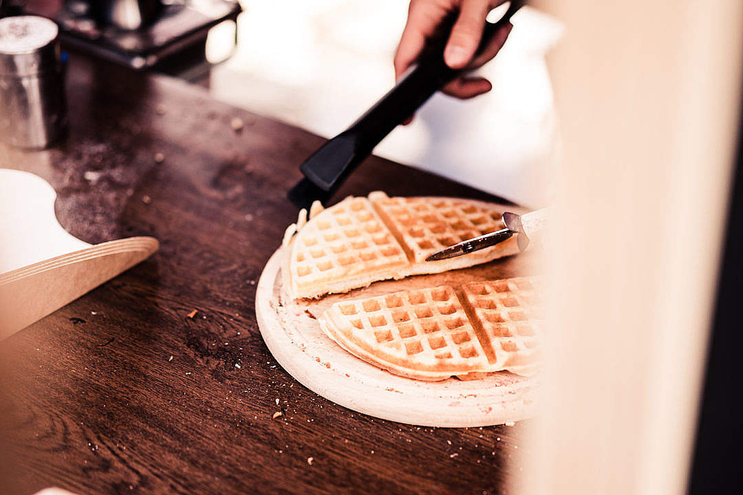 Download Making Waffles Cutting Them into Pieces FREE Stock Photo